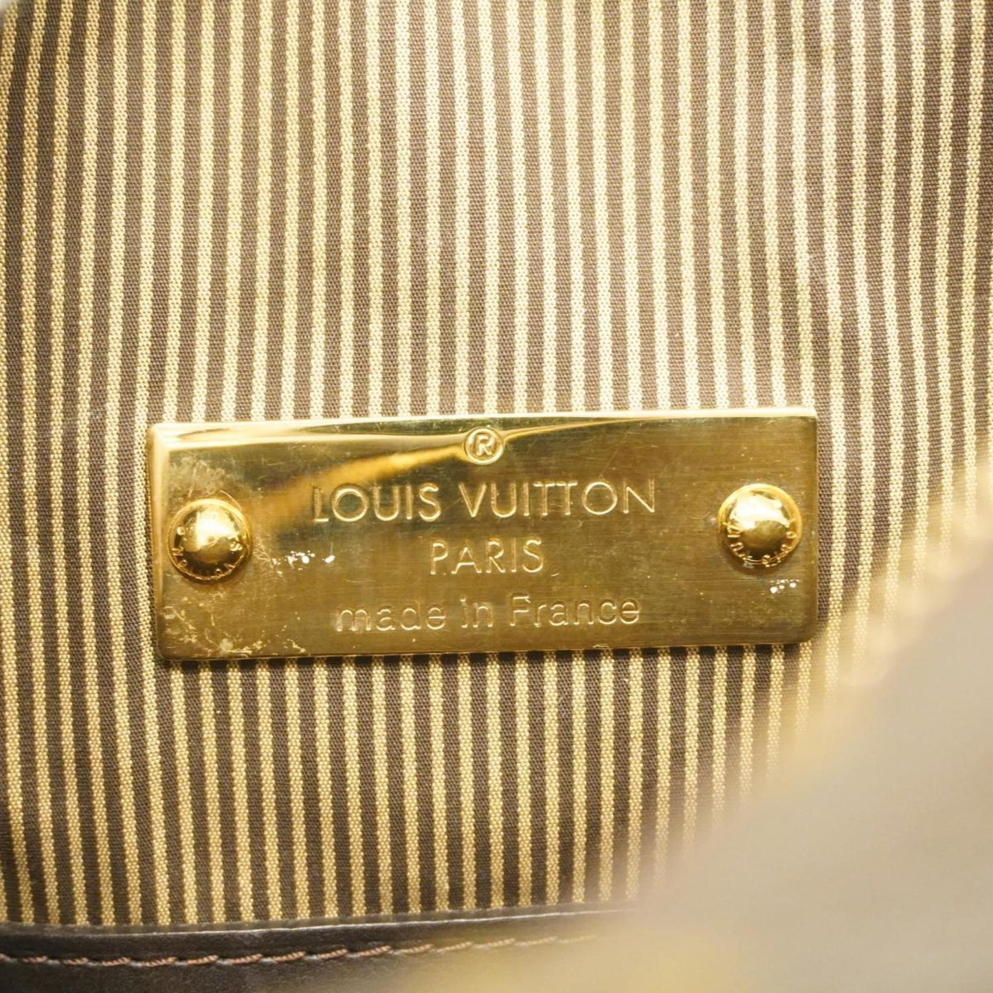Louis Vuitton Bequia Canvas Handbag ()