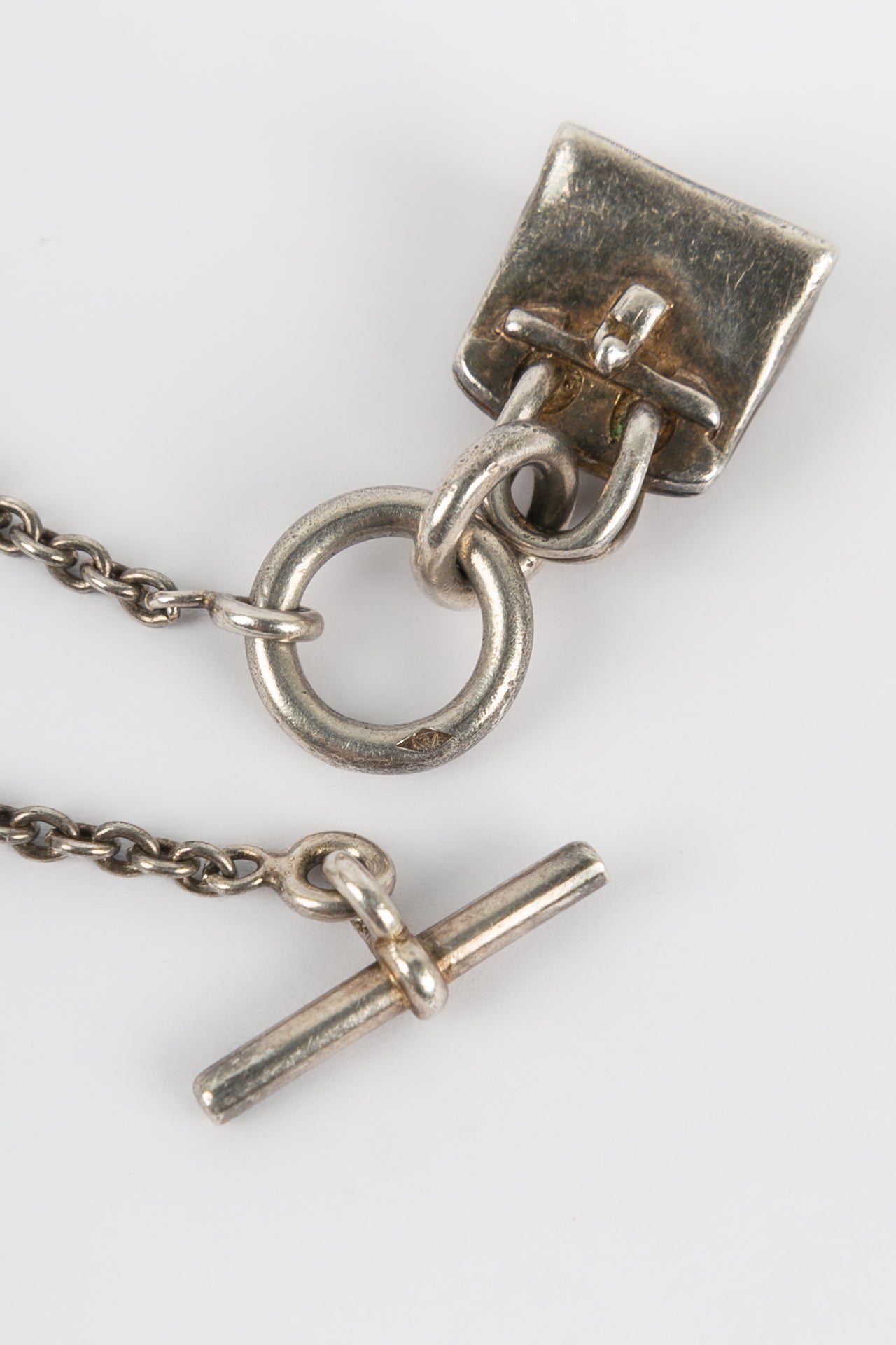 Collier Amulette en argent Hermès