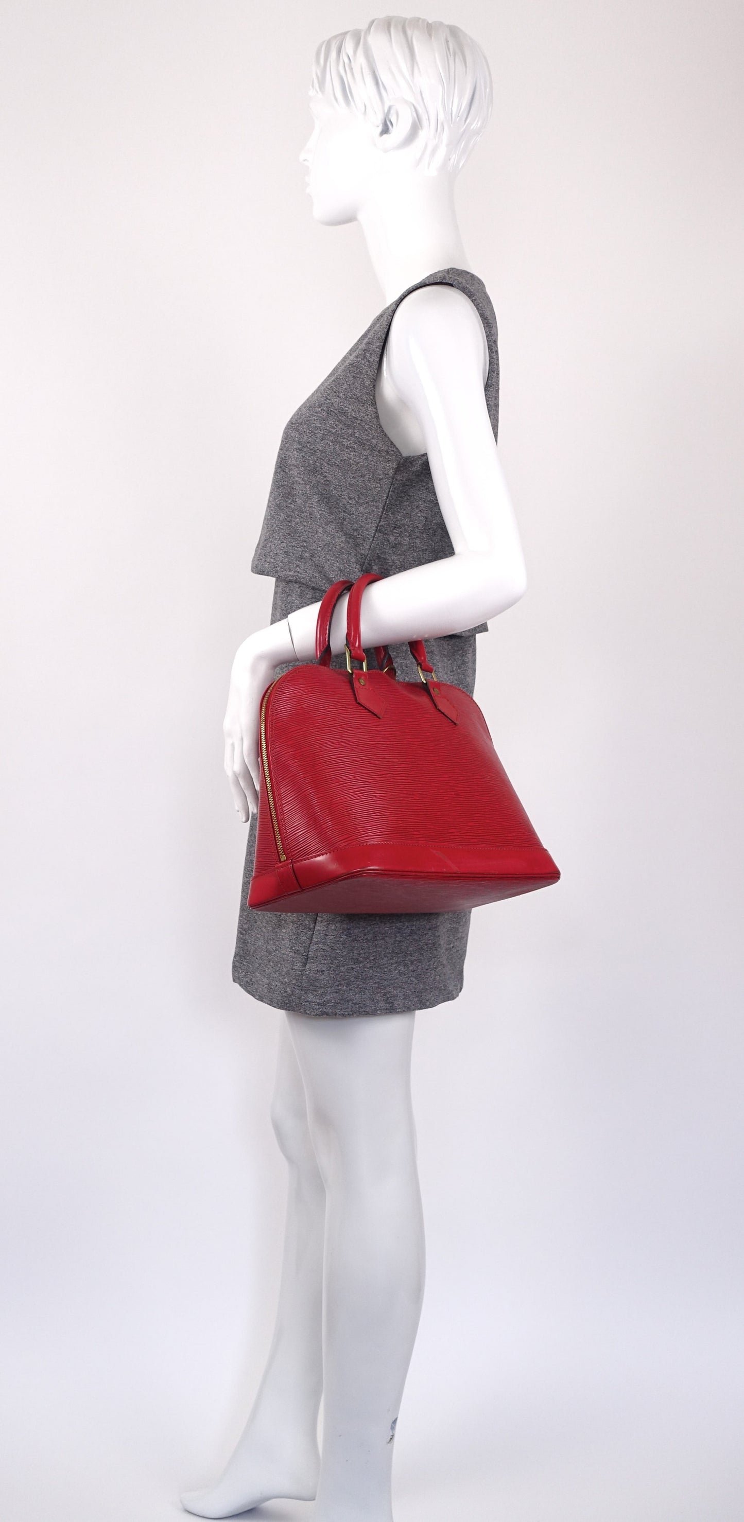 Louis Vuitto Epi Leather Alma PM Handbag