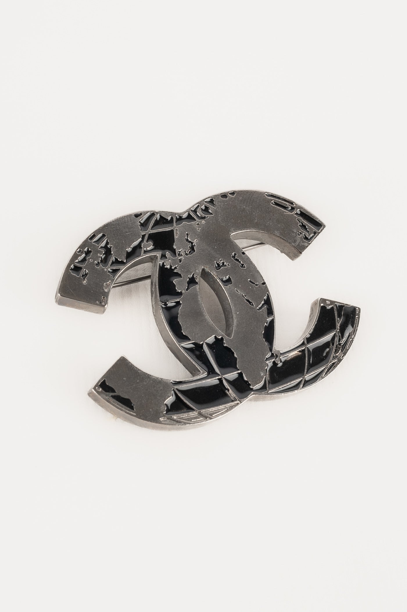 Broche planÃ¨te Chanel 2013