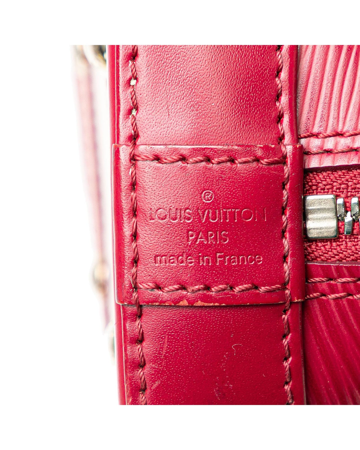 Epi Leather Alma BB with Rolled Handles and Shoulder Strap