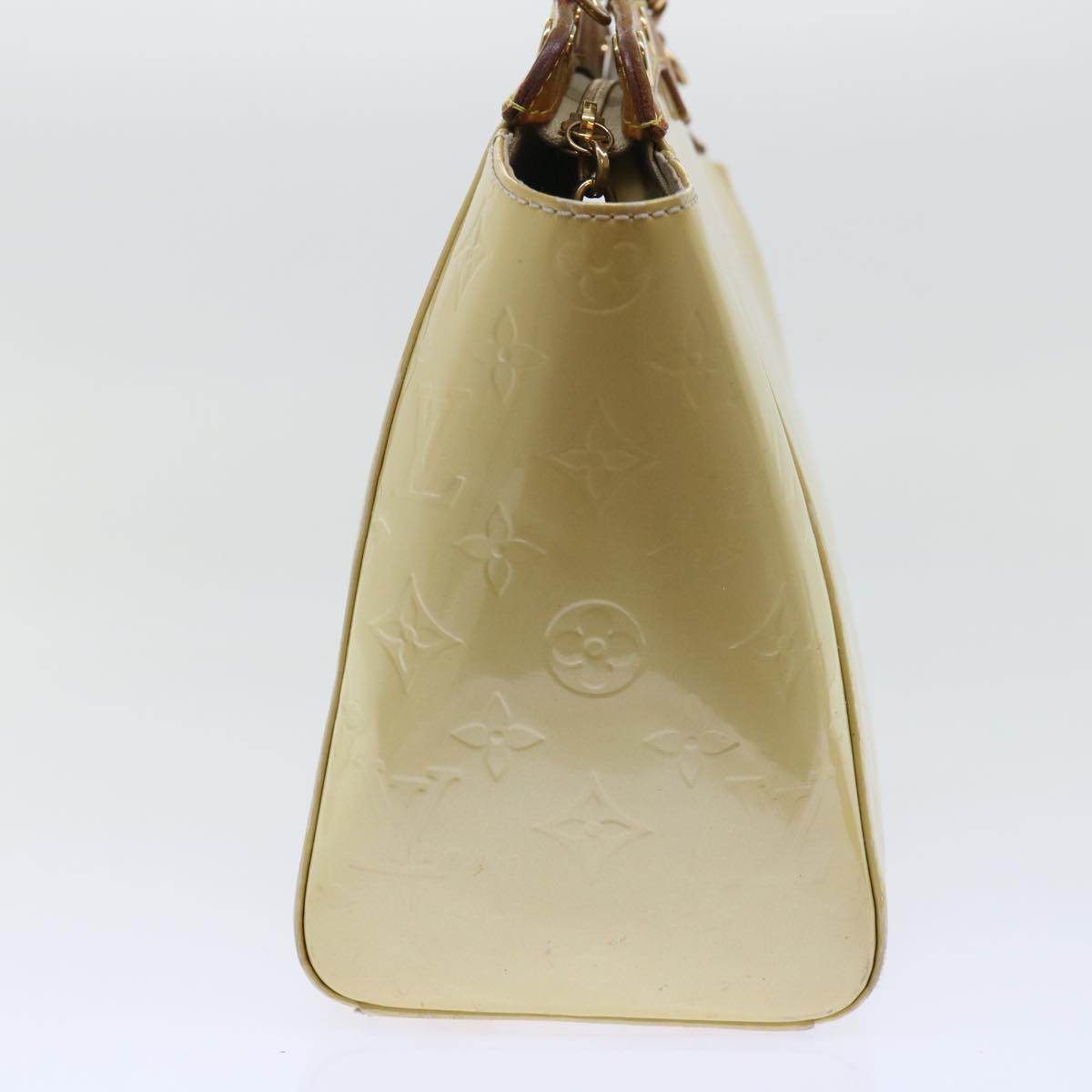Sophisticated Beige Patent Leather Handbag