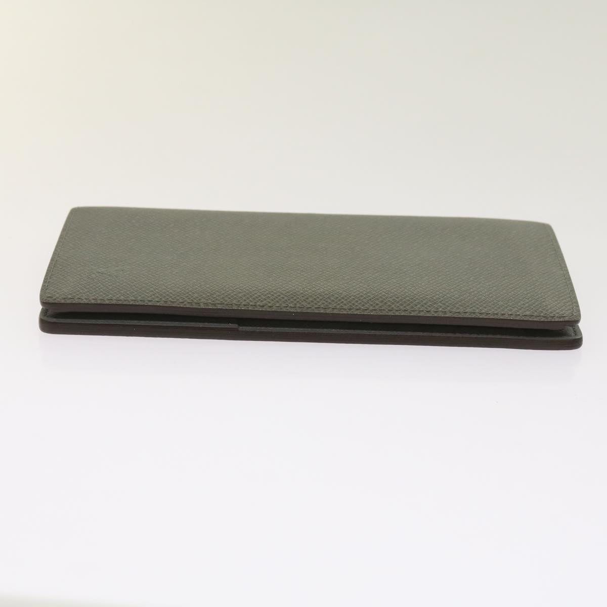 Sophisticated Taiga Leather Long Wallet with Ample SpaceEssentials