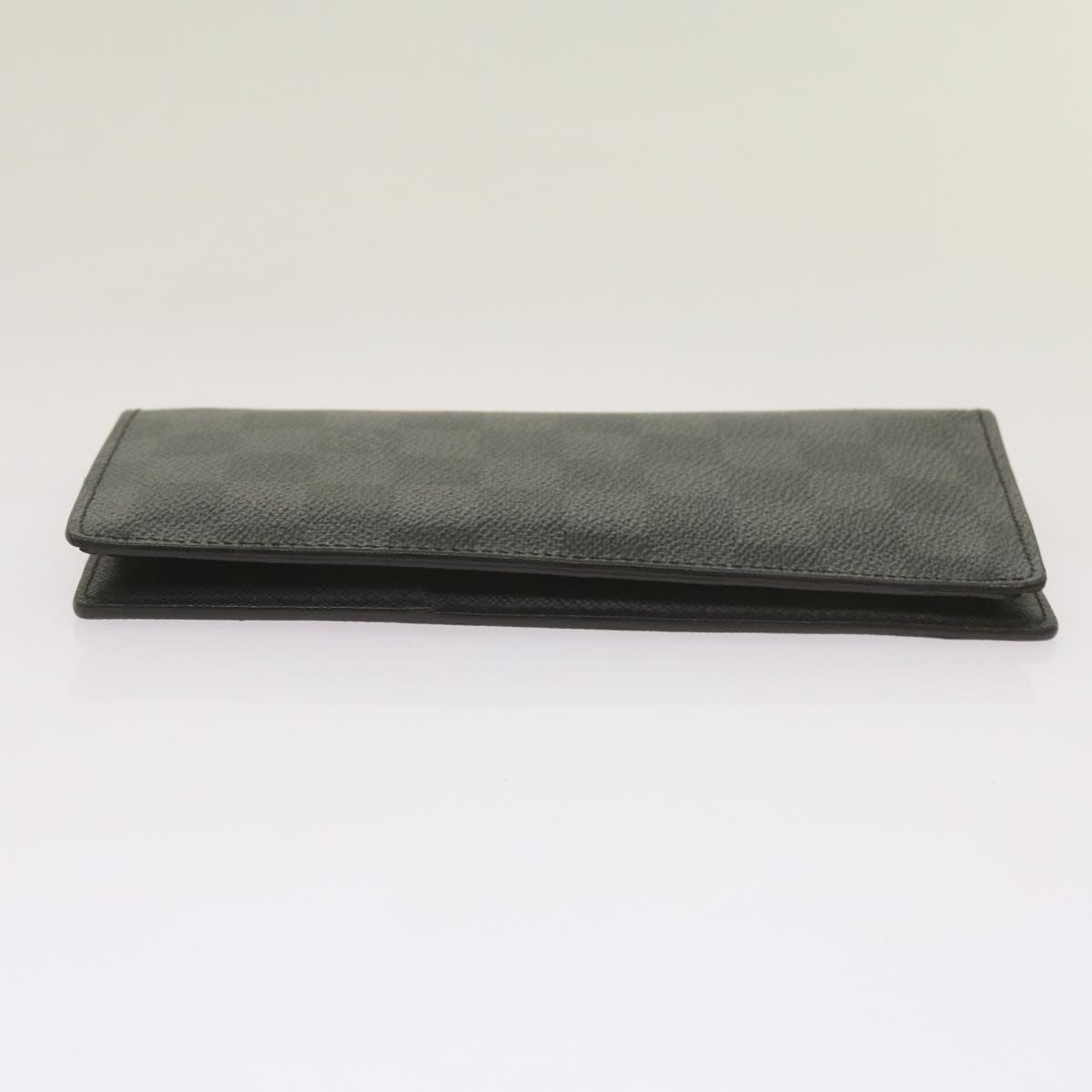 Sophisticated Black Damier Graphite Long Wallet with Multiple Compartments and Card Slots