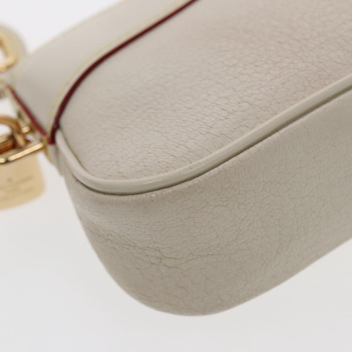 Pochette Mtis Reverse Monogram Clutch