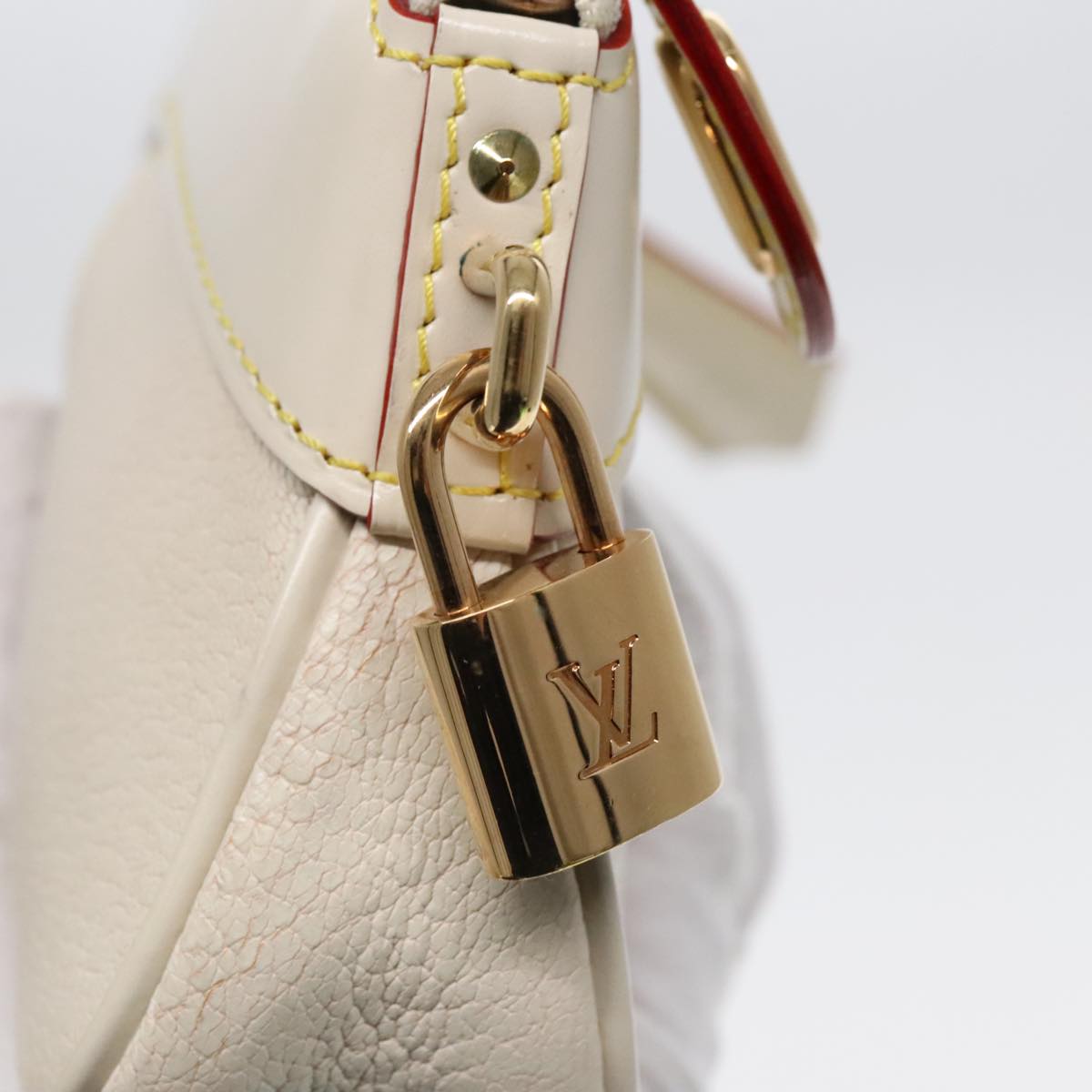 Pochette Mtis Reverse Monogram Clutch