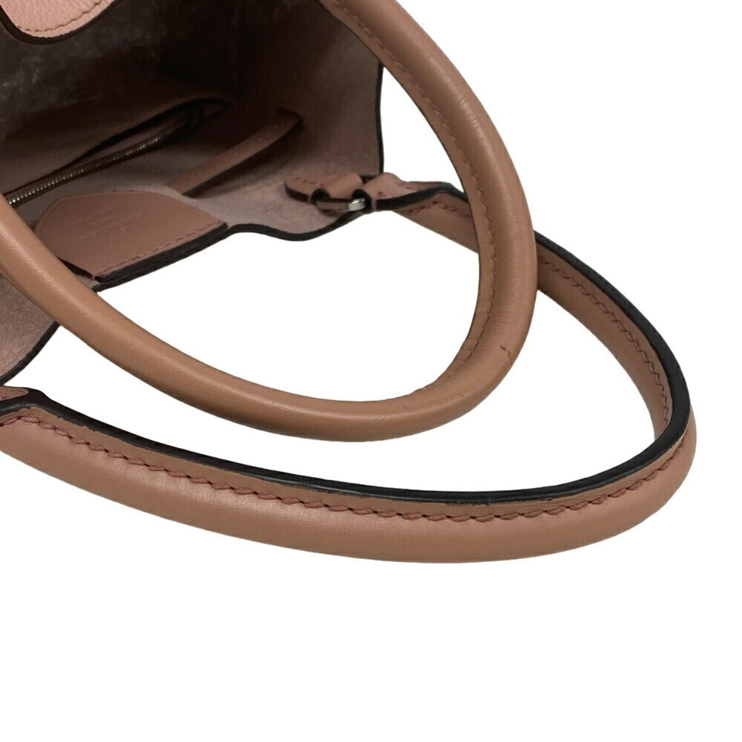 Lockme Bucket Empreinte Leather Handbag