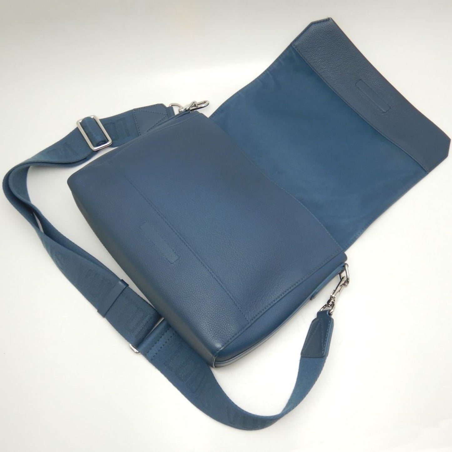Elegant Leather Shoulder Bag with Dust Bag and Strap