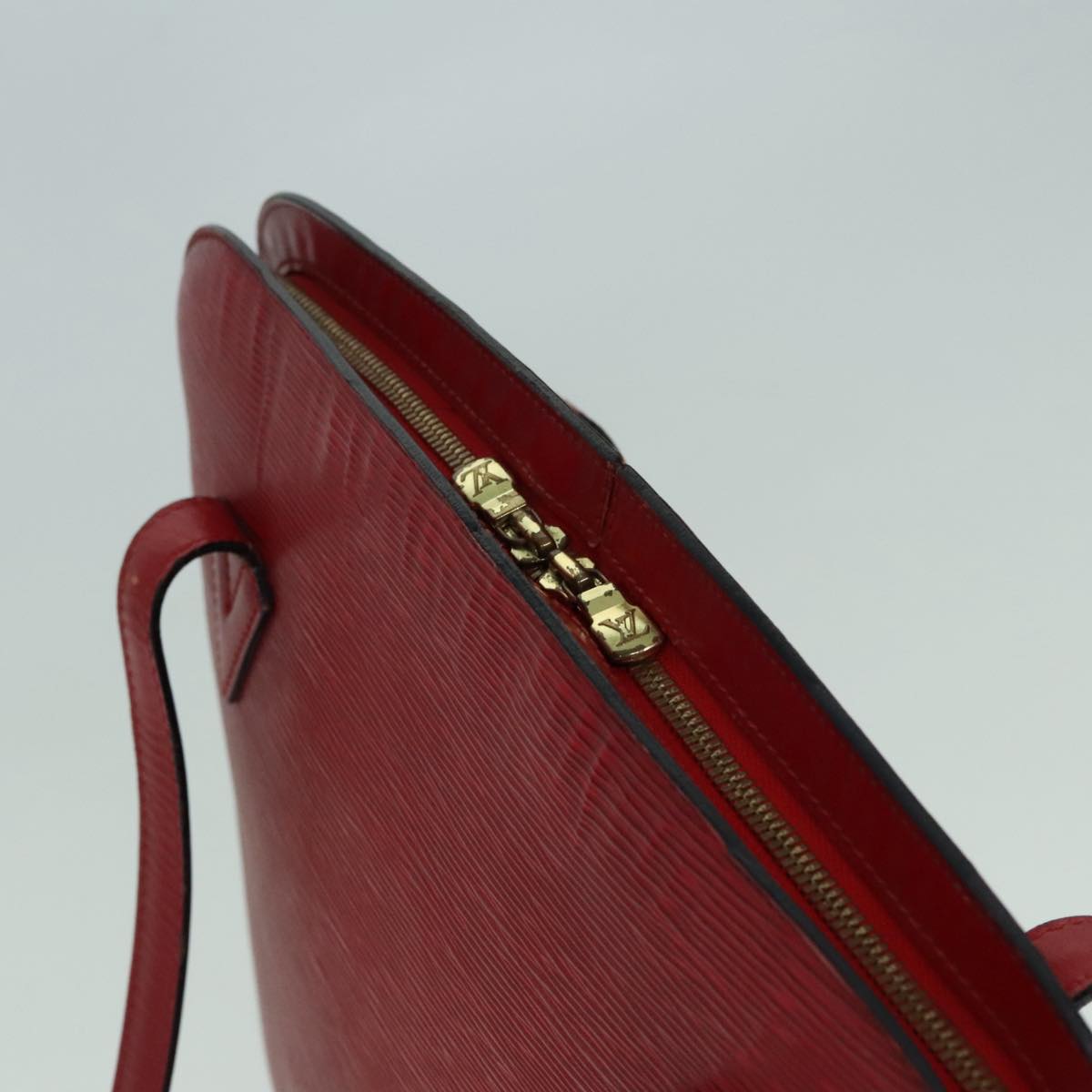 Epi Alma Red Leather Handbag