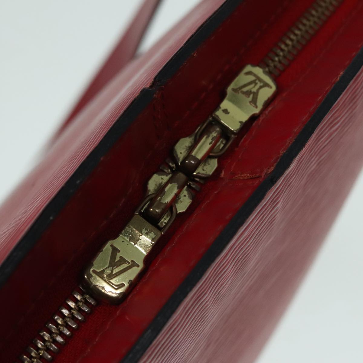 Epi Alma Red Leather Handbag