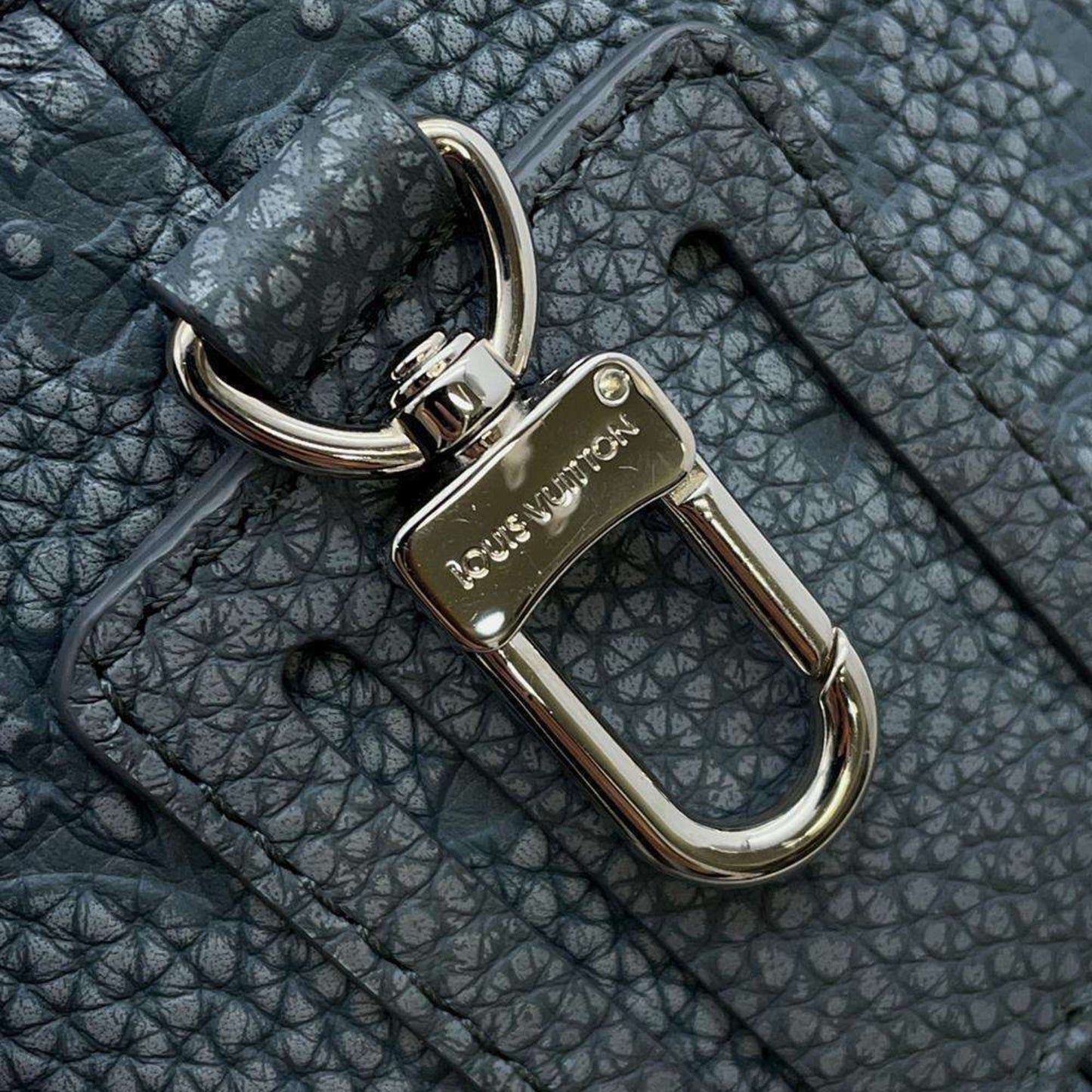Pochette Mtis Reverse Monogram