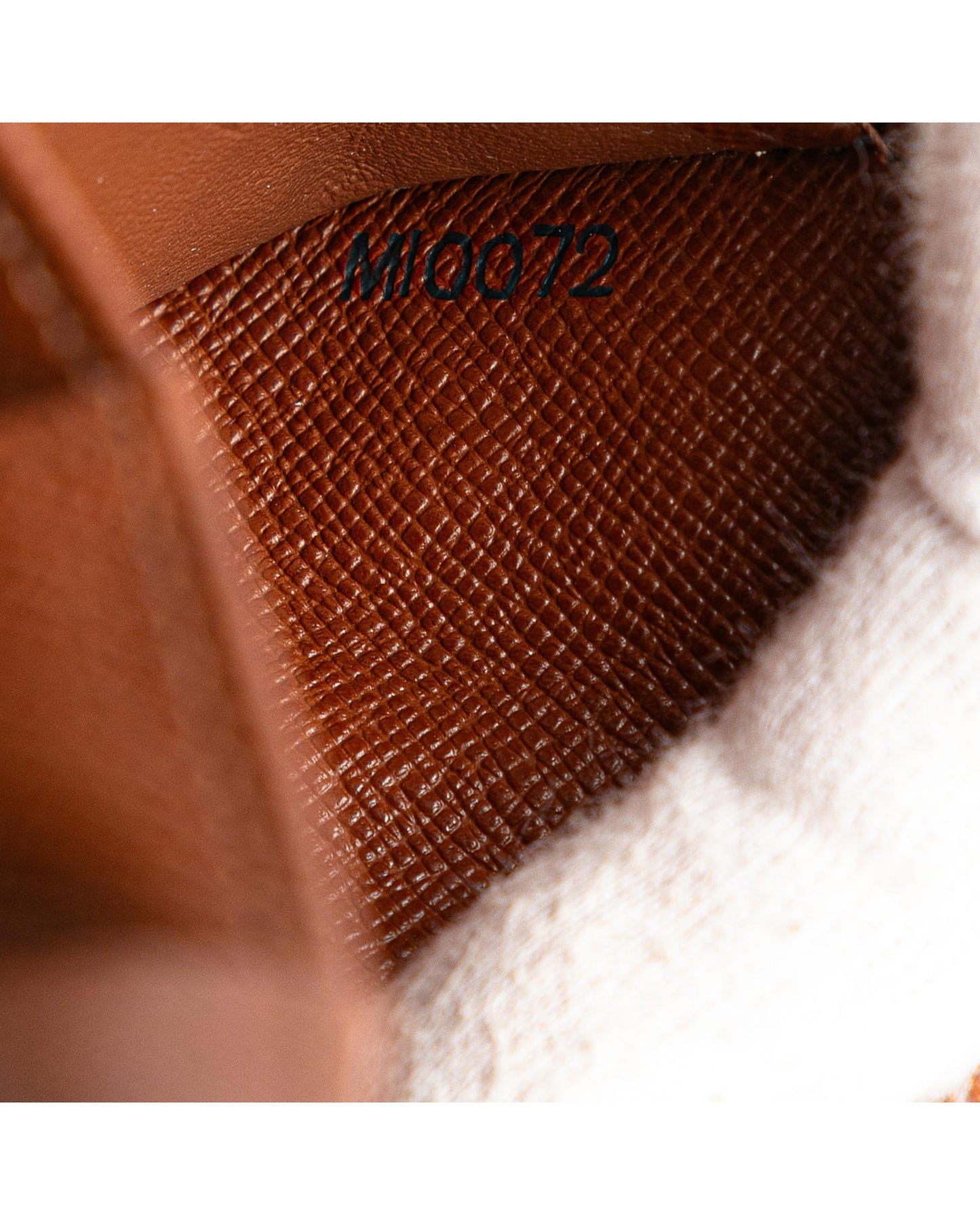 Monogram Bi-Fold Wallet with Snap Closure and Interior Zip Compartment