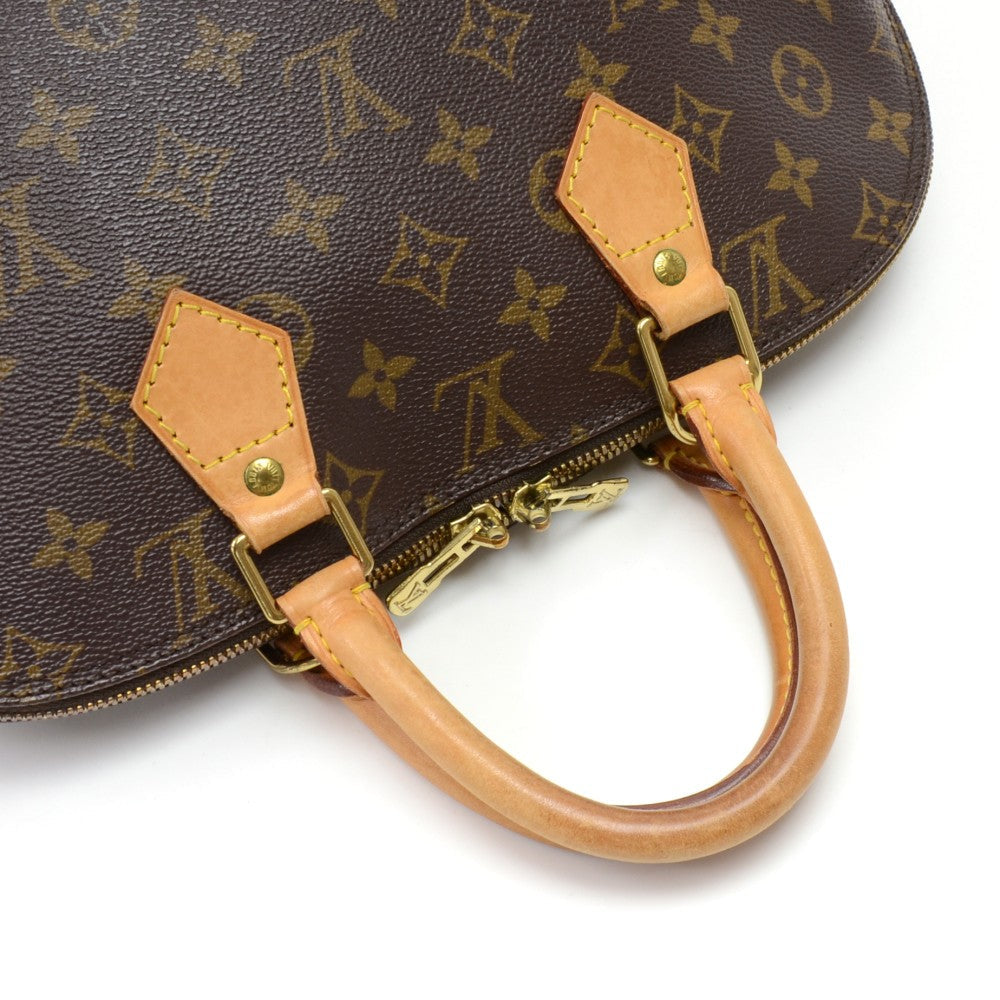 Louis Vuitto Alma Monogram Canvas Handbag