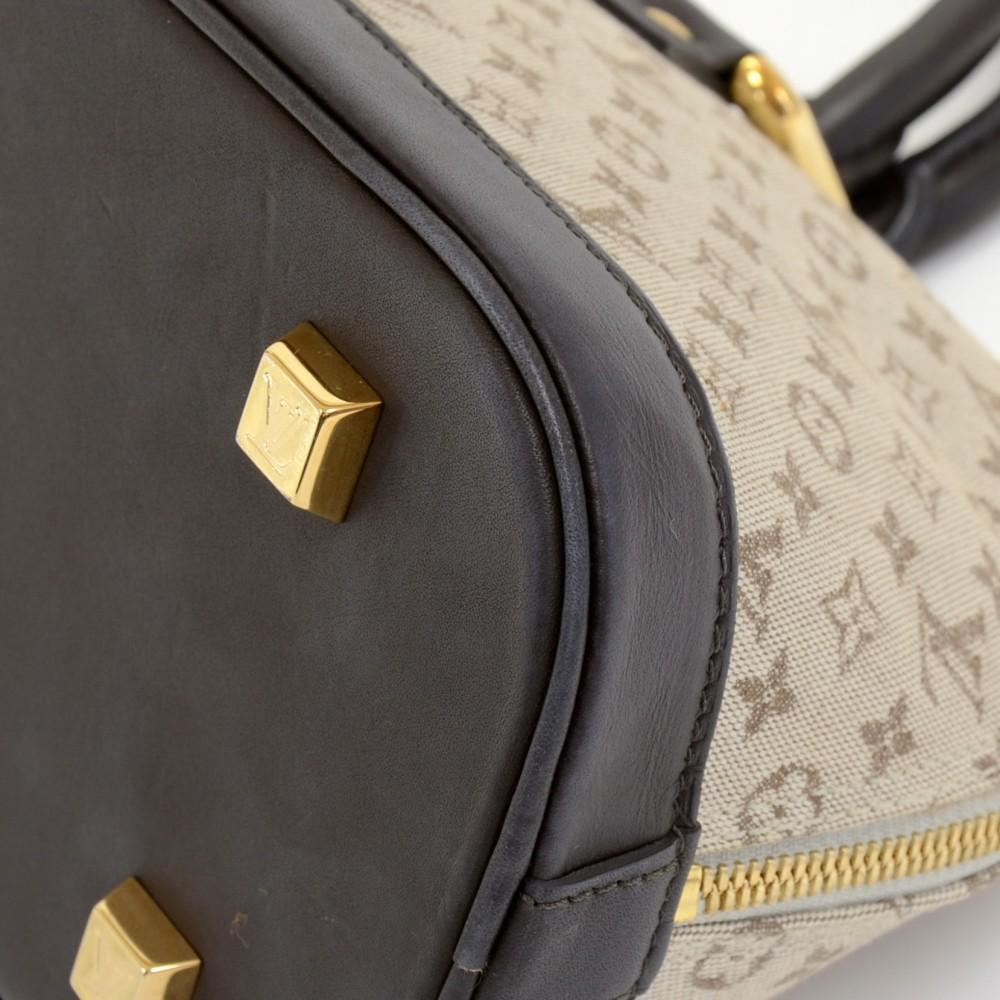 Louis Vuitto Alma Long Mini Lin Canvas Handbag