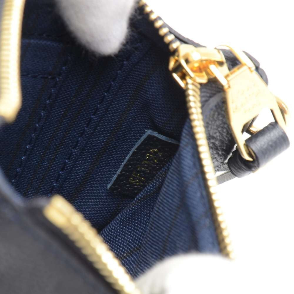 Louis Vuitto Citadine Empreinte Leather Pochette Bag