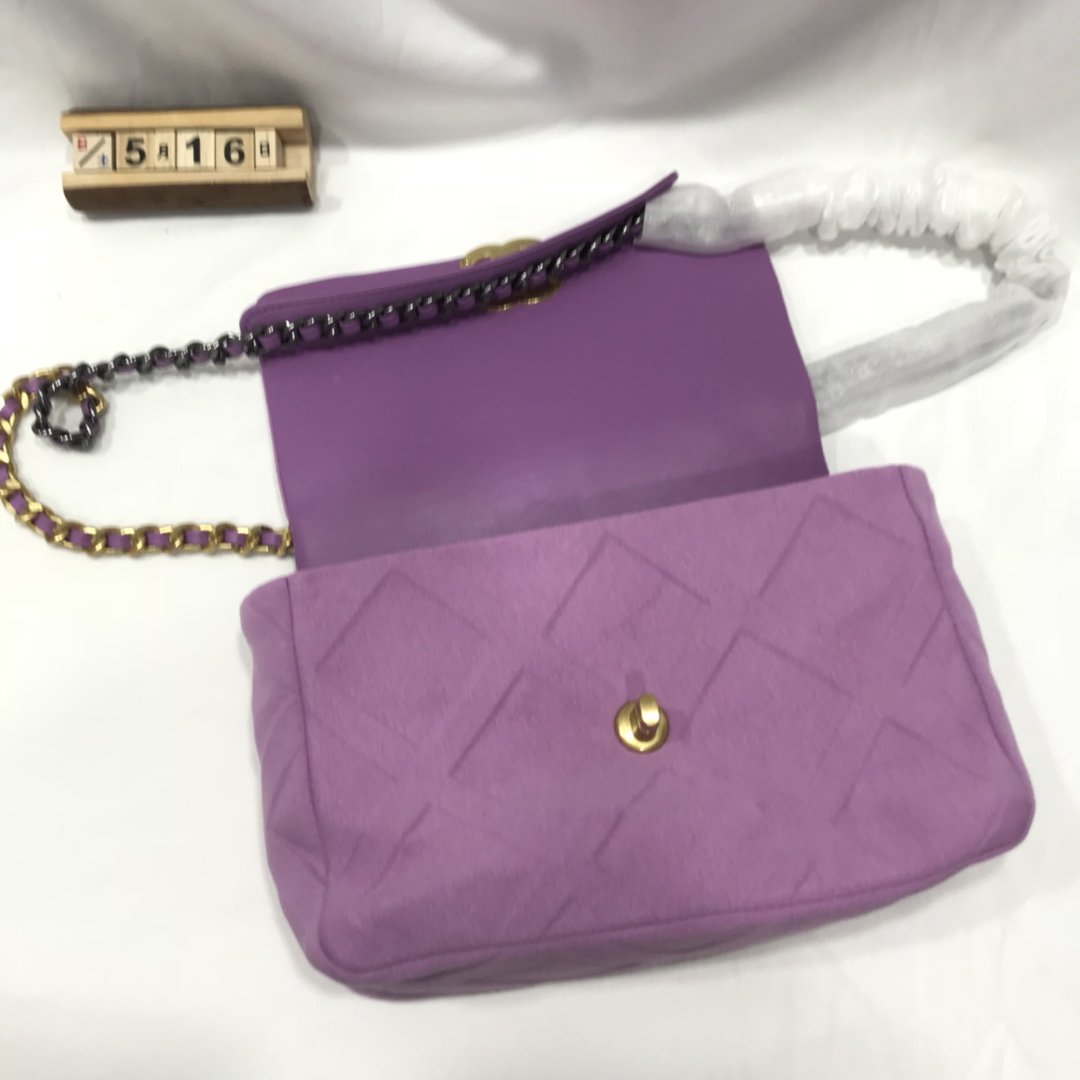 Designer bags by Chanel 196