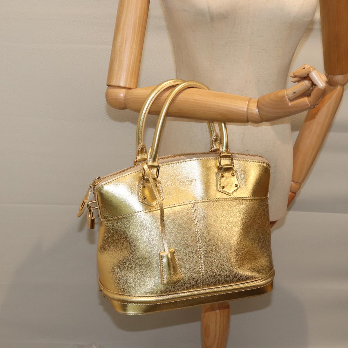 LOUIS VUITTON Suhari Lockit PM Hand Bag Leather Gold All M95433 LV 71447