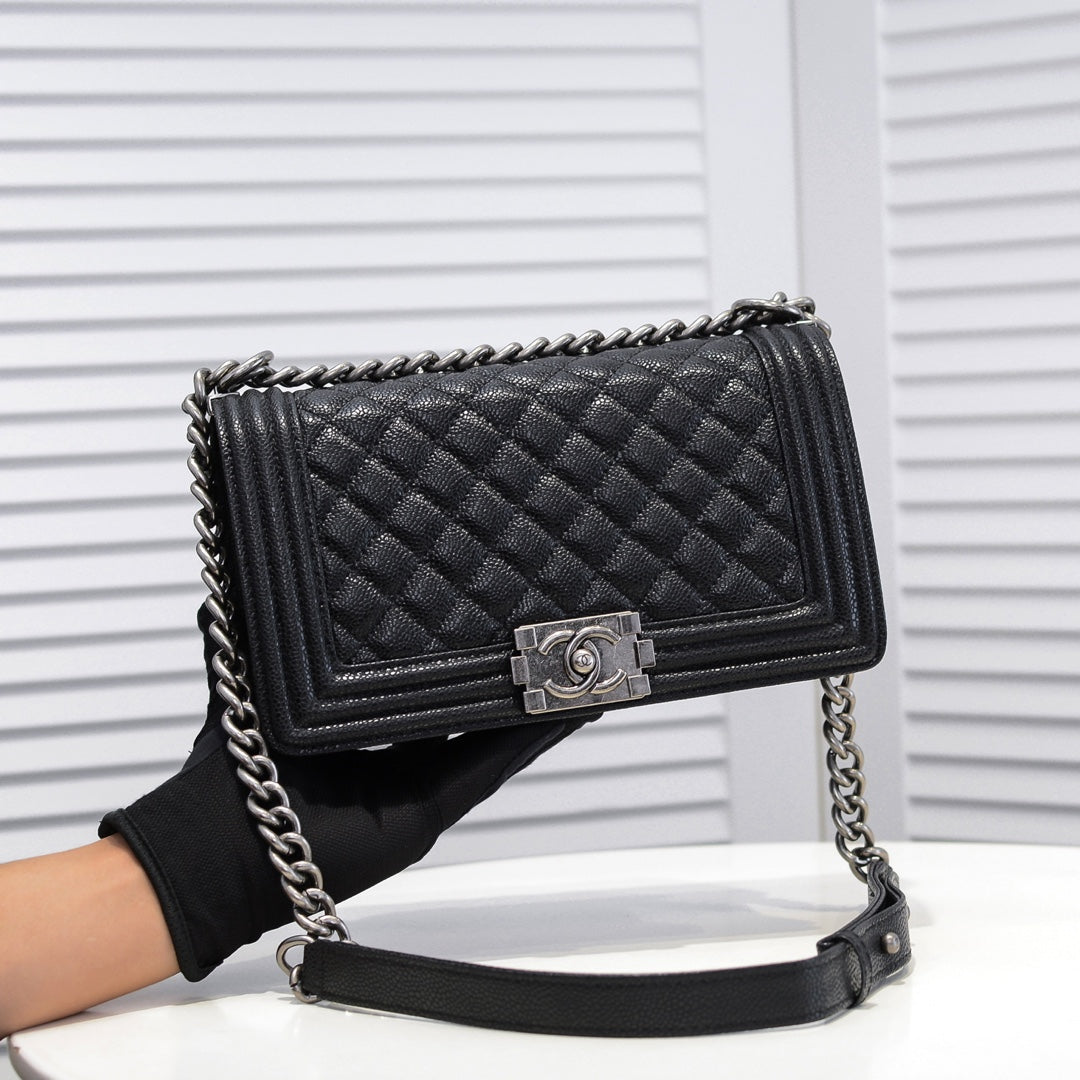 Designer bags by Chanel 143