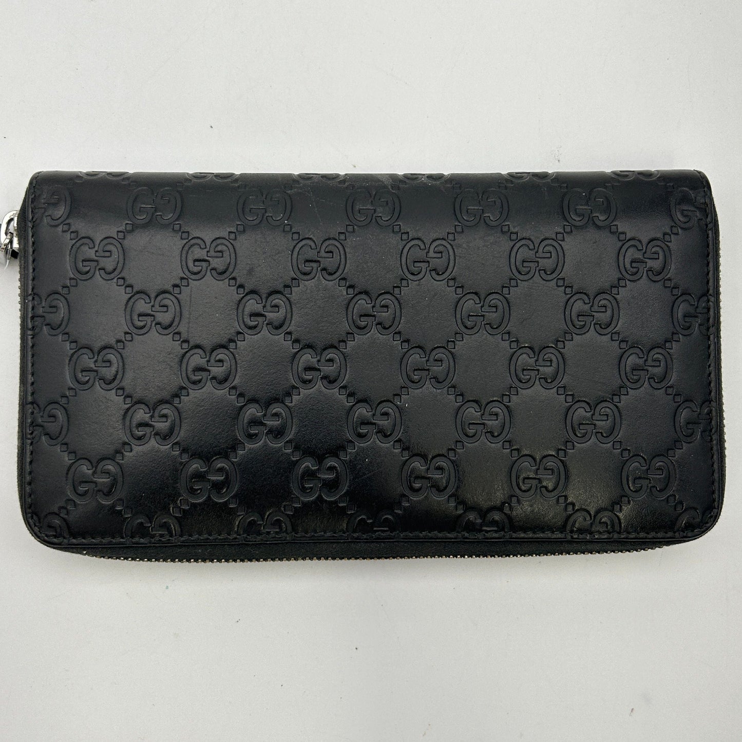 Gucci GG rubber-effect zip around wallet in black leather gu6612gd