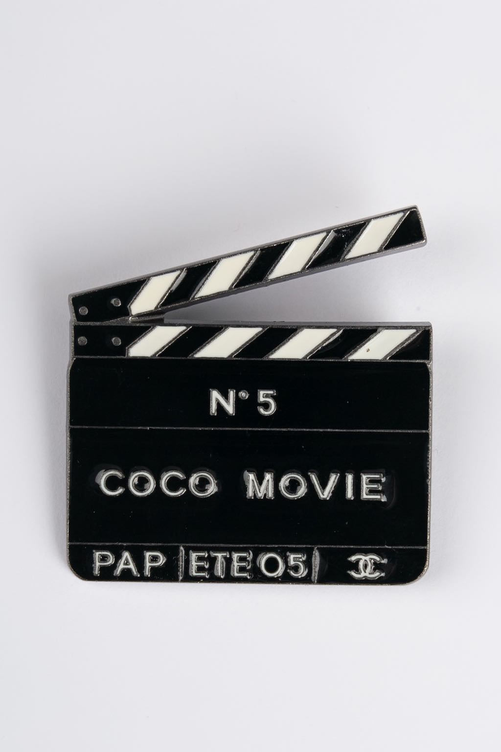 Broche clap de cinÃ©ma Chanel 2005
