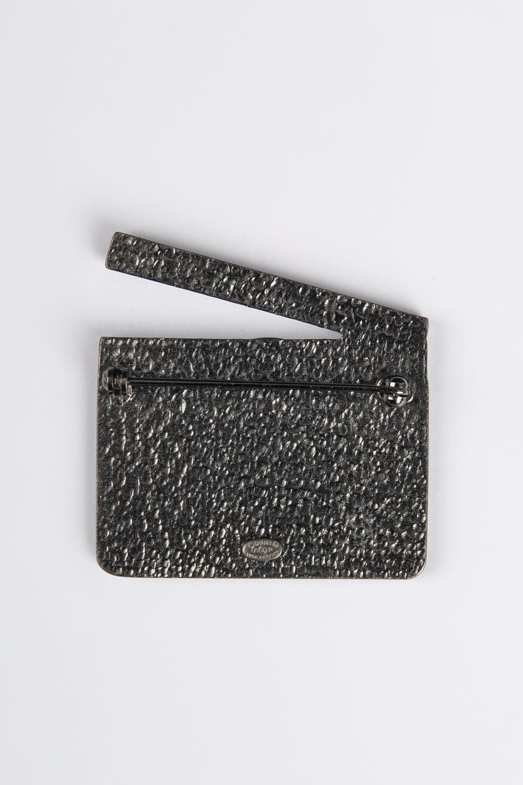 Broche clap de cinÃ©ma Chanel 2005