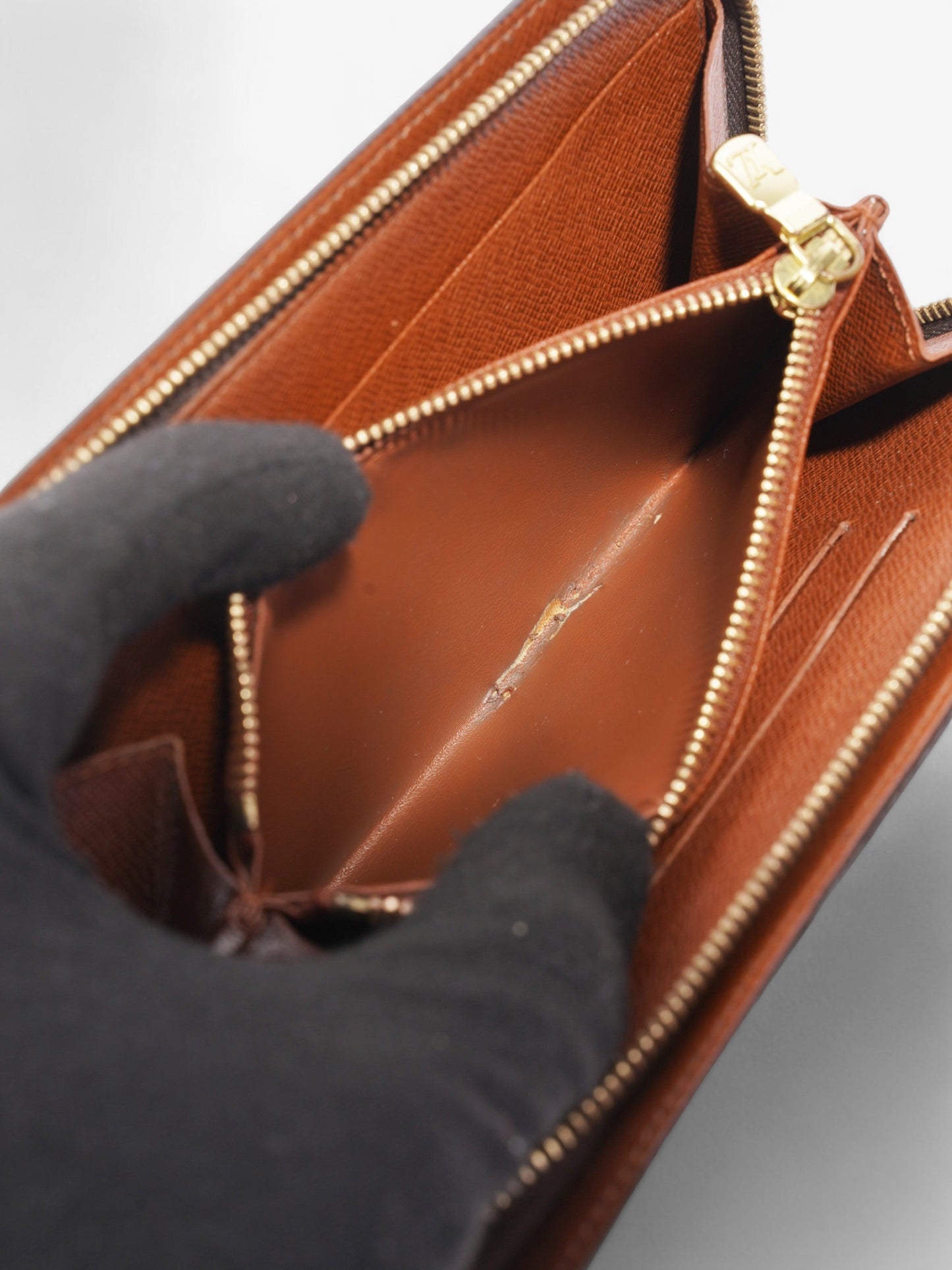 Louis Vuitton Porte Monnaie Zip Monogram Coated Canvas