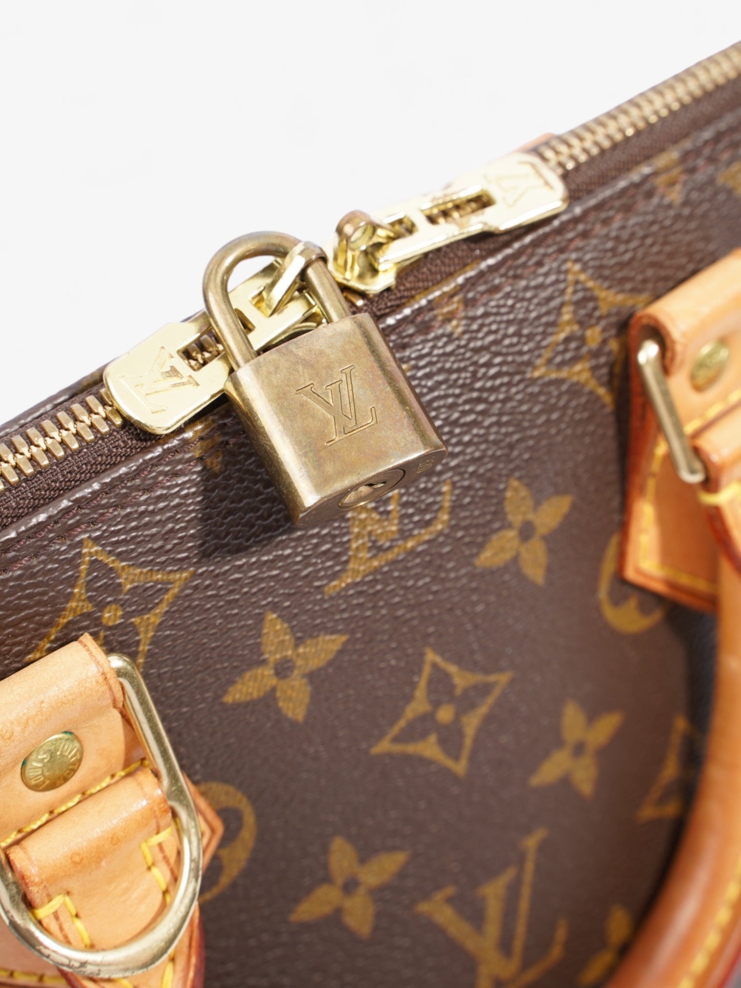 Louis Vuitton Alma Monogram Coated Canvas PM