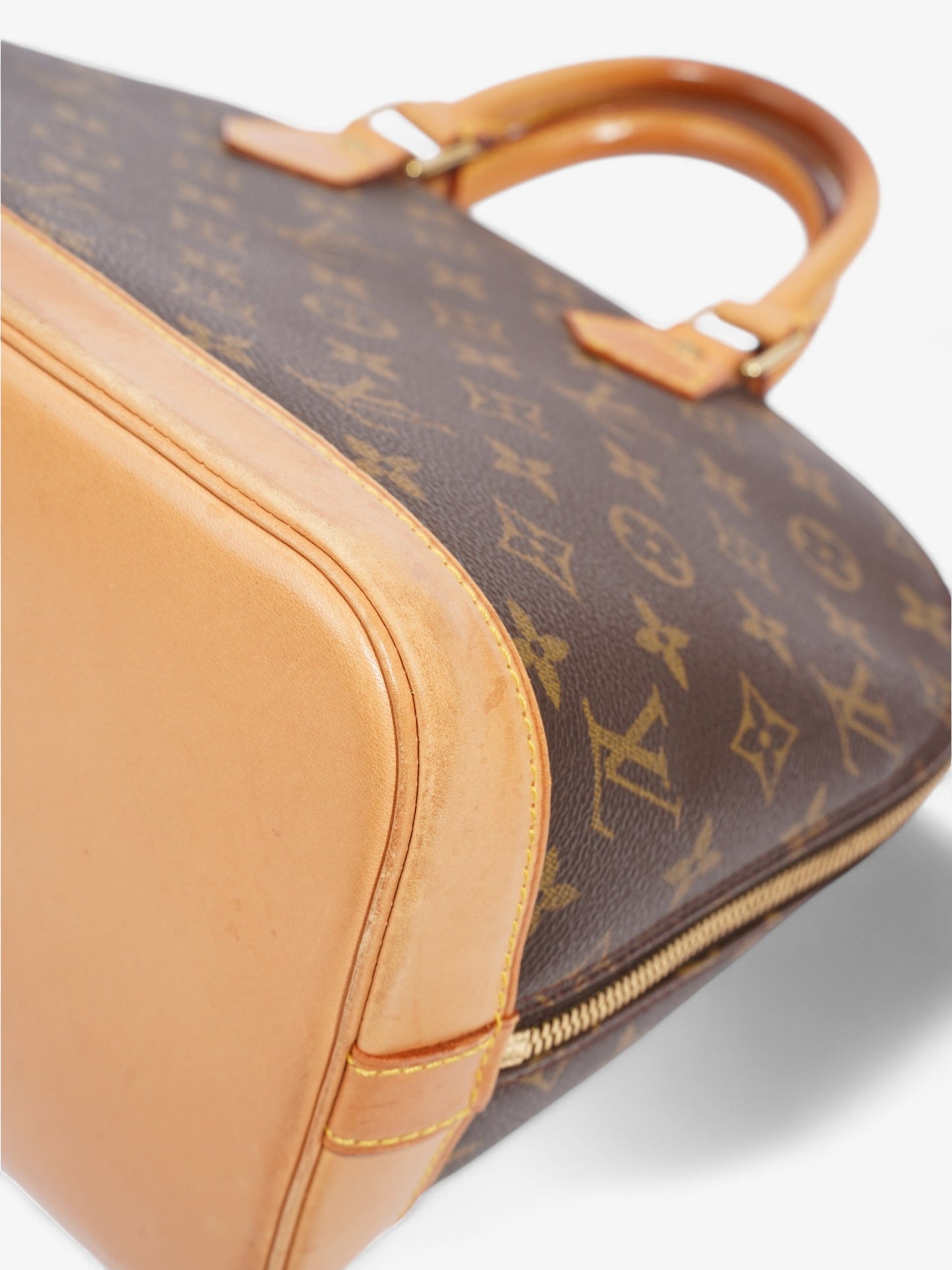 Louis Vuitton Alma Monogram Coated Canvas PM