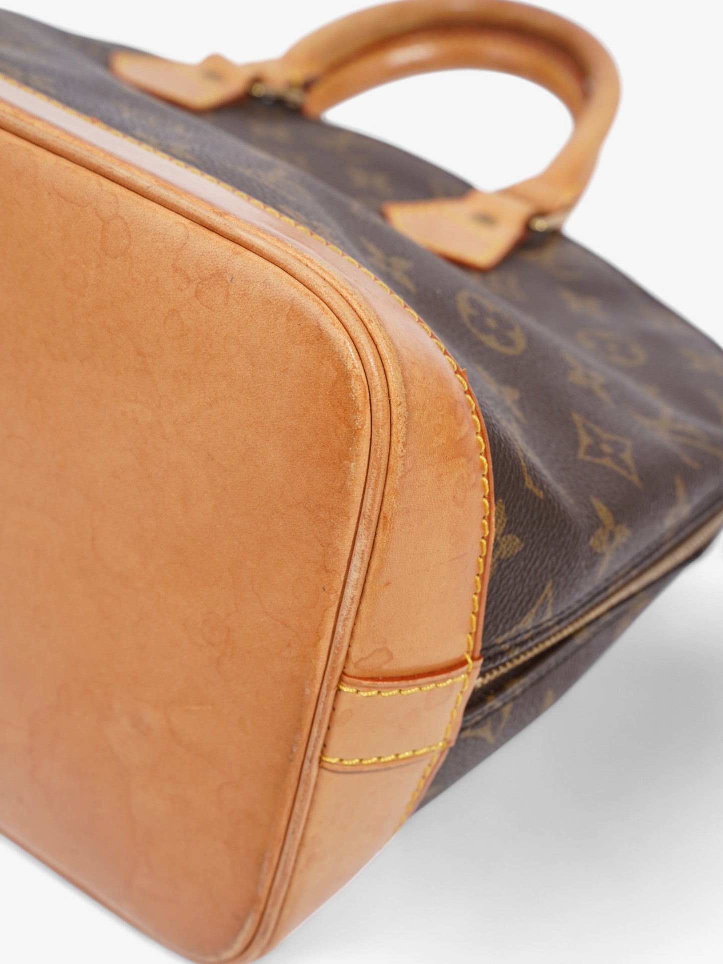 Louis Vuitton Alma Monogram Coated Canvas PM