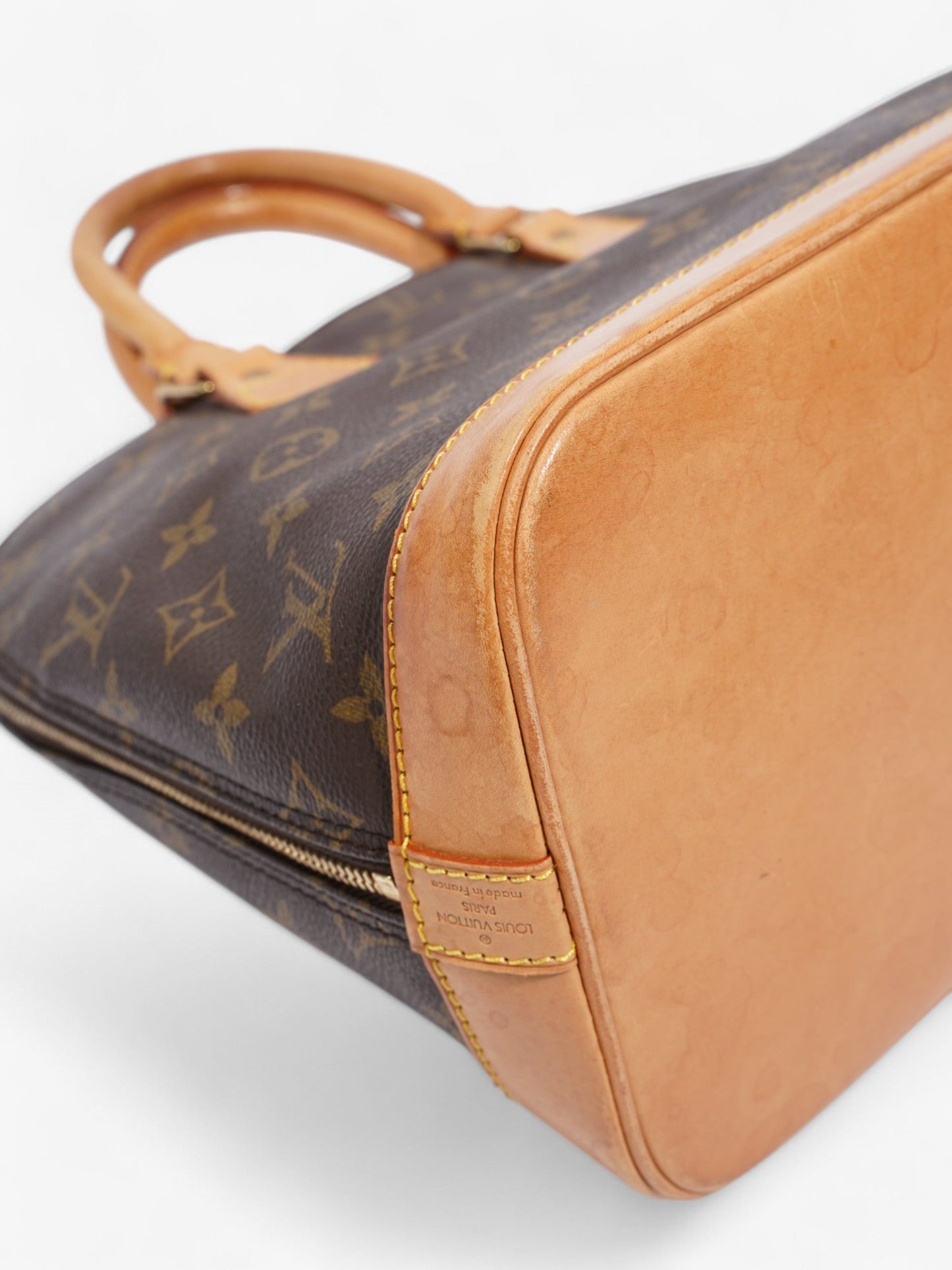 Louis Vuitton Alma Monogram Coated Canvas PM