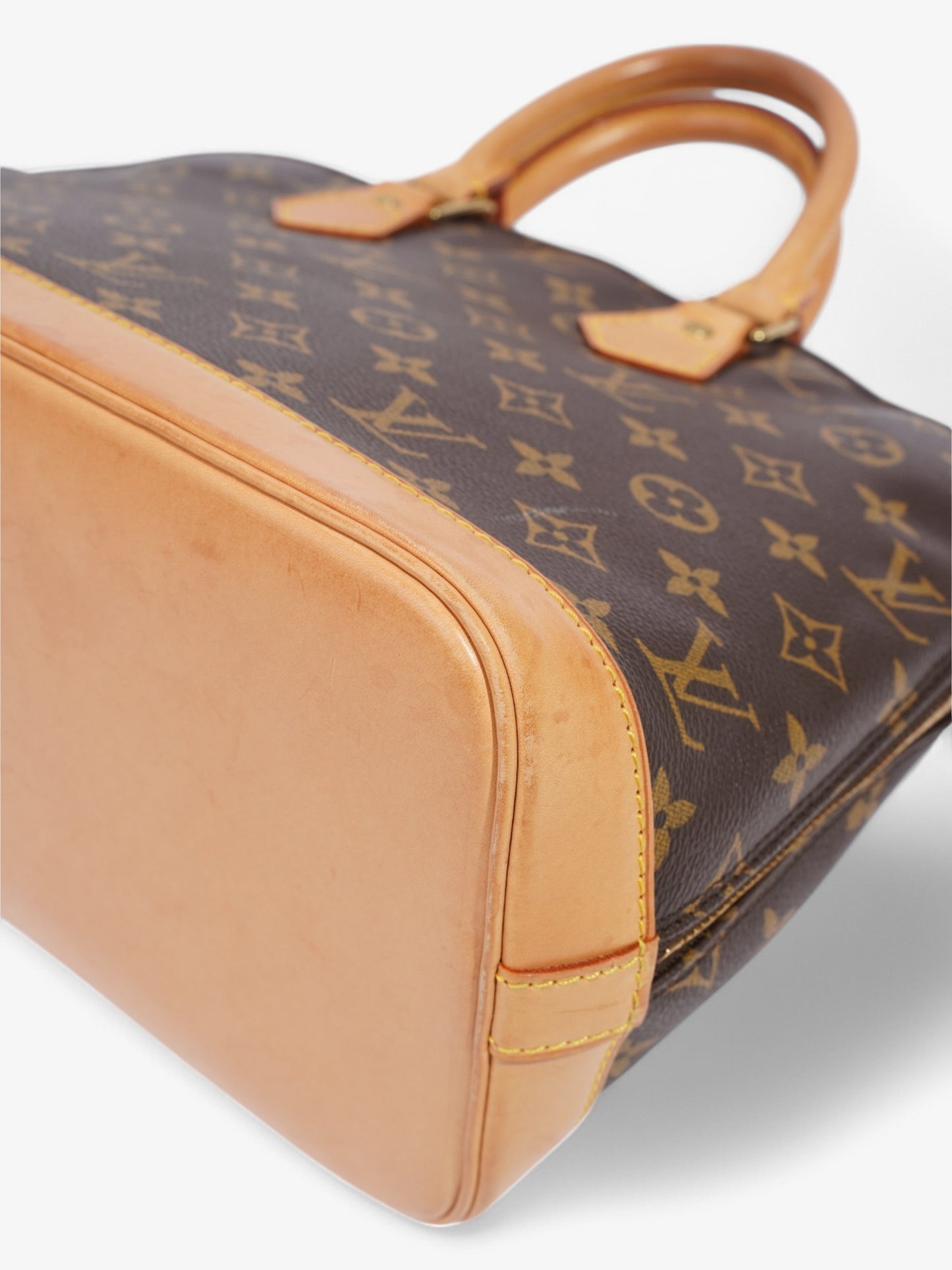 Louis Vuitton Alma Monogram Coated Canvas PM