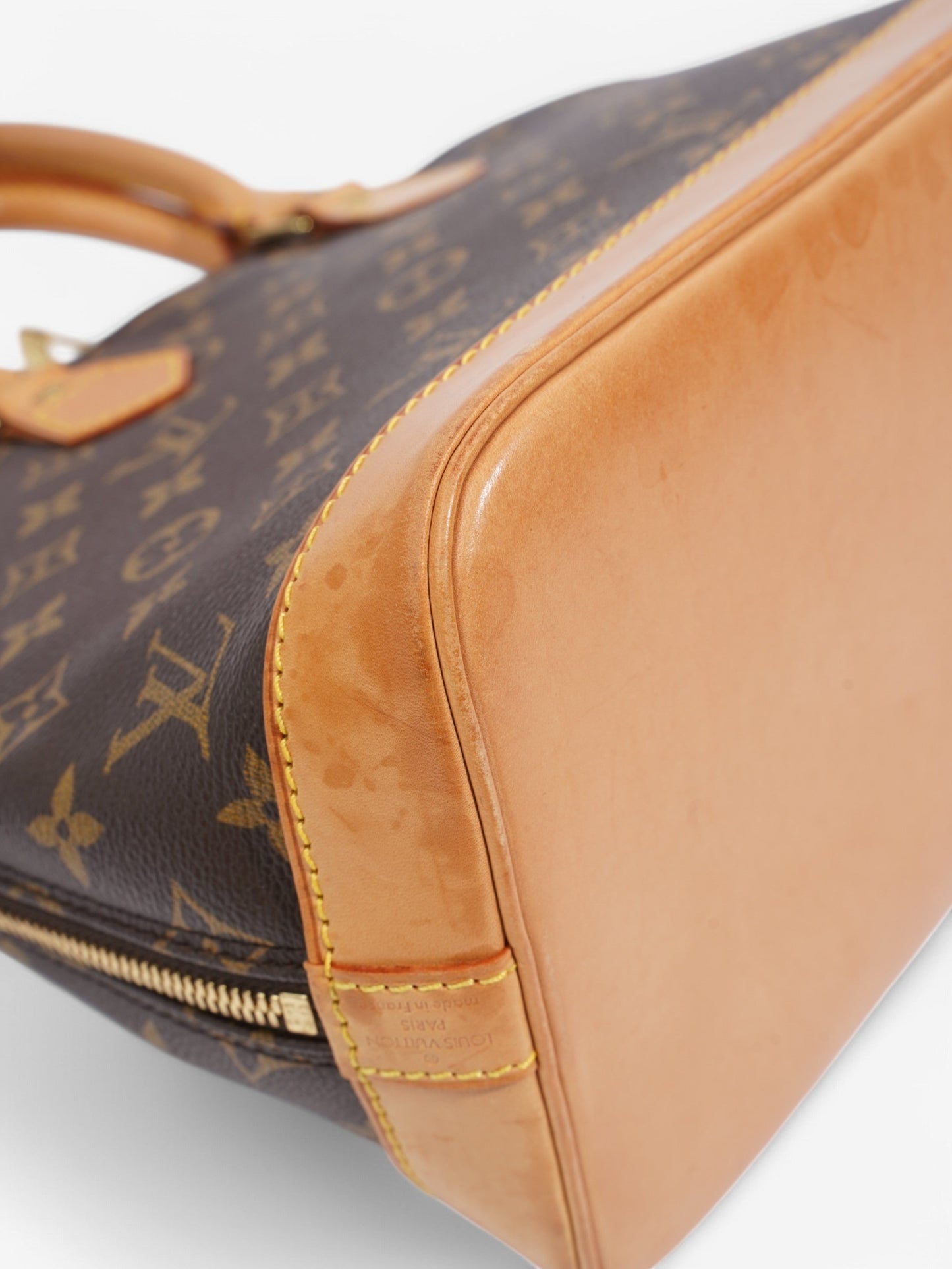 Louis Vuitton Alma Monogram Coated Canvas PM