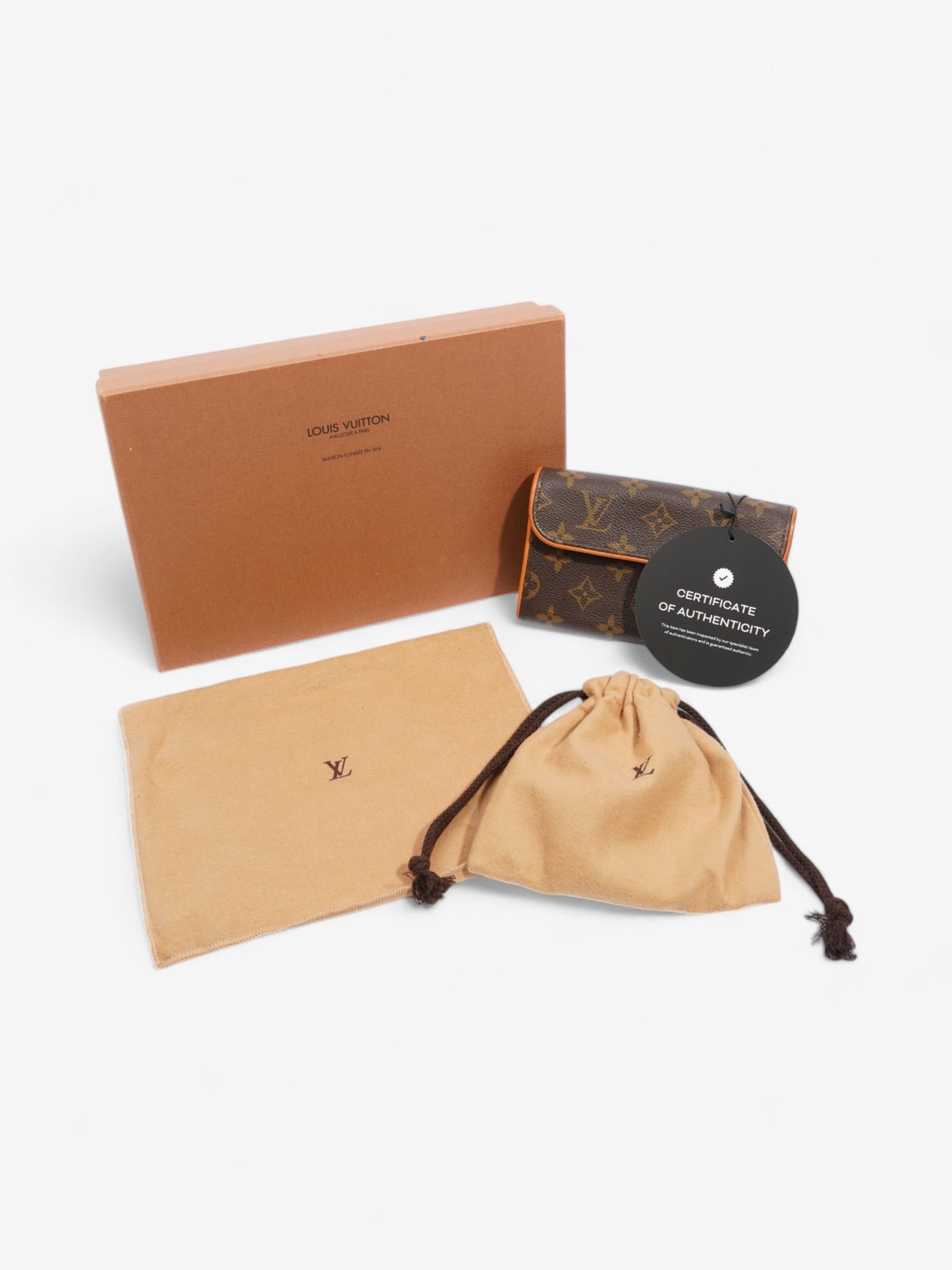 Louis Vuitton Pochette Florentine Monogram Canvas XS