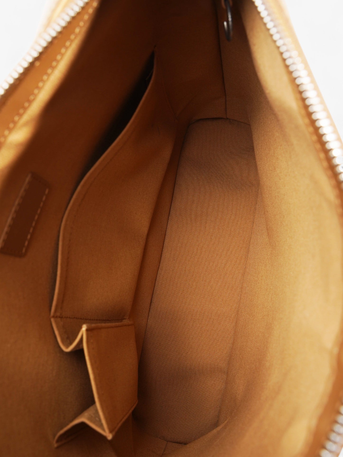 Louis Vuitton Matt Ambre Gold Embossed Leather One size