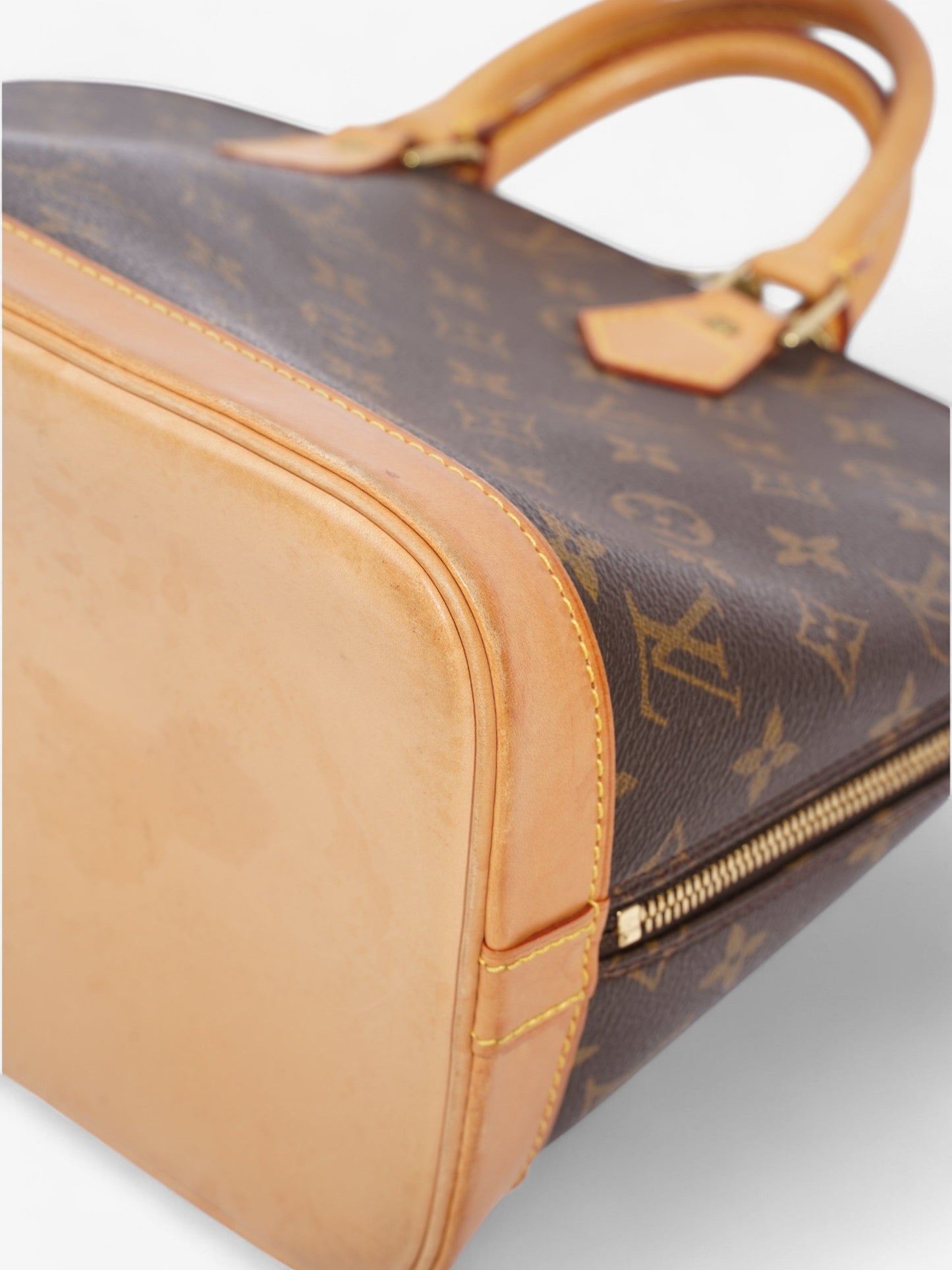 Louis Vuitton Alma Monogram Coated Canvas PM