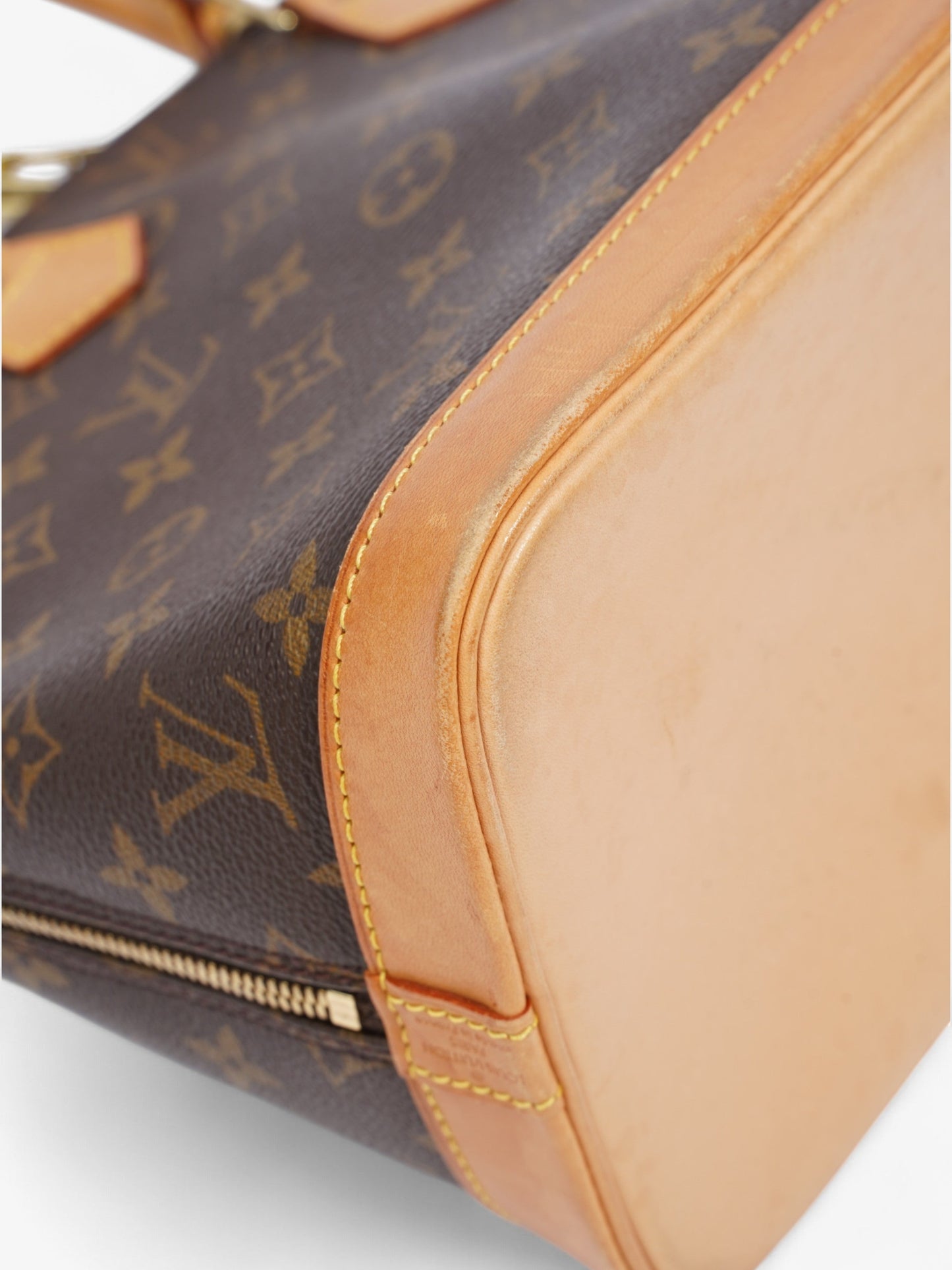 Louis Vuitton Alma Monogram Coated Canvas PM