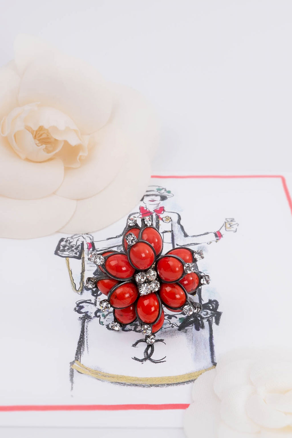 Broche en pÃ¢te de verre Chanel Printemps 1996