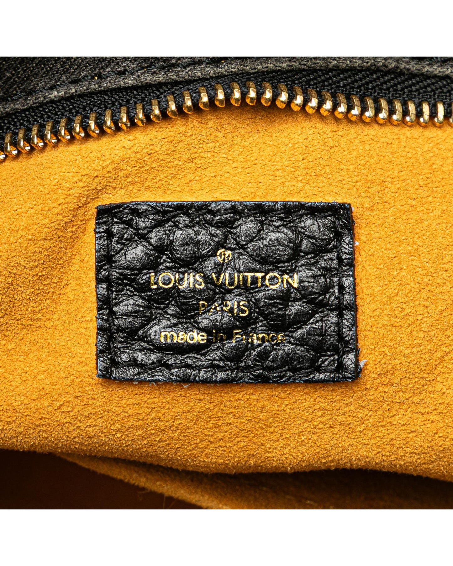 Monogram Denim Neo Cabby GM with Leather Trim and Top Zip Closure