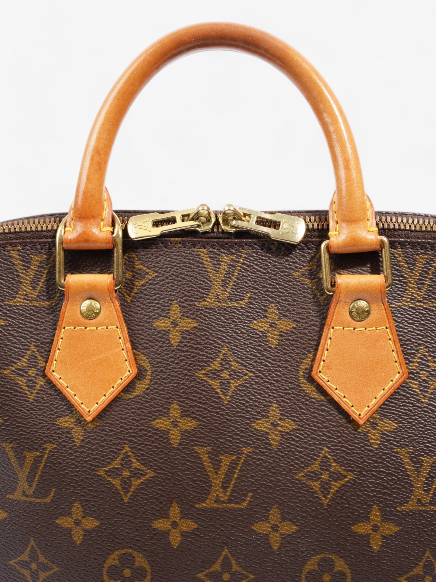 Louis Vuitton Alma Monogram Coated Canvas PM