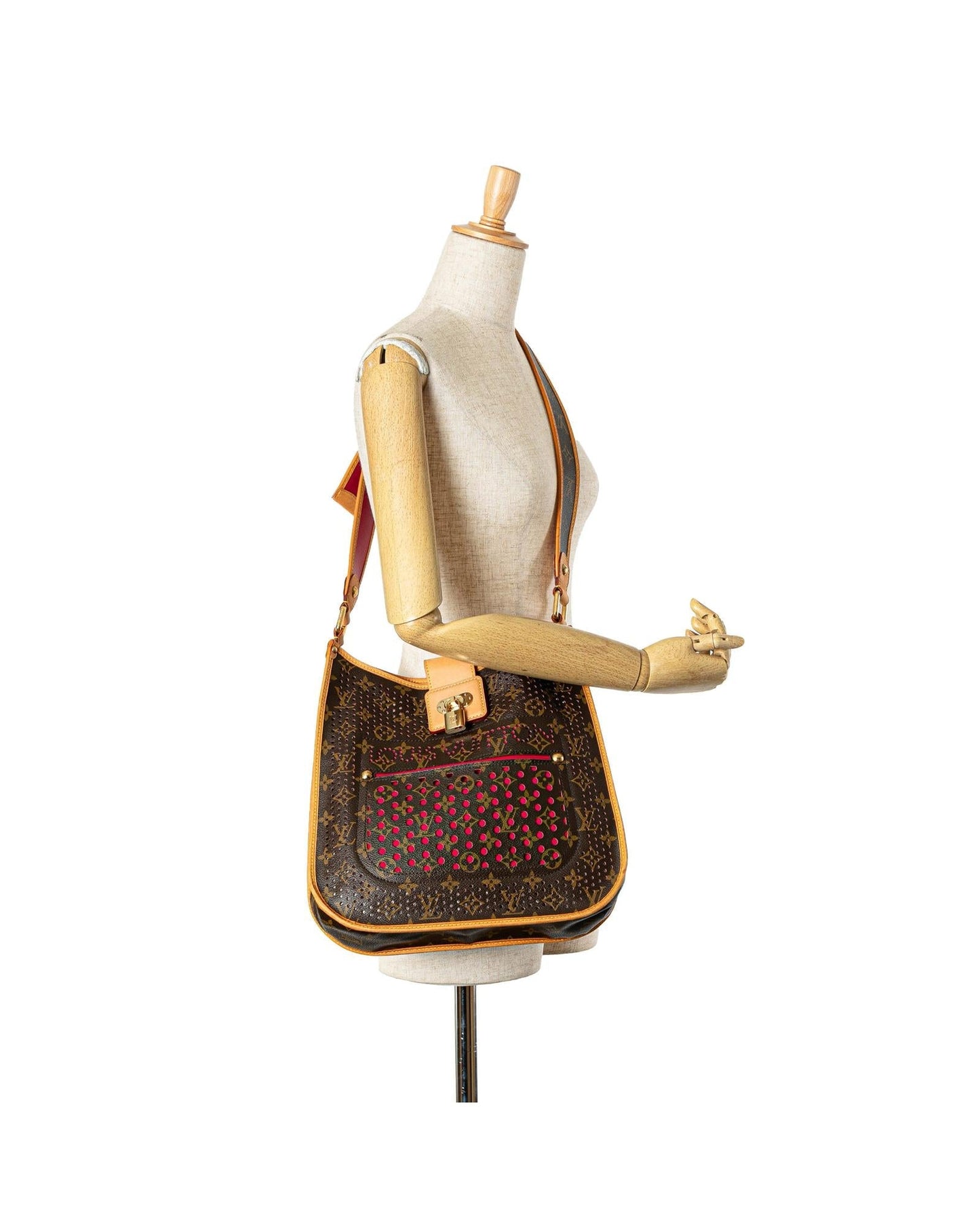 Monogram Perforated Canvas Musette with Vachetta Trim and Adjustable Strap