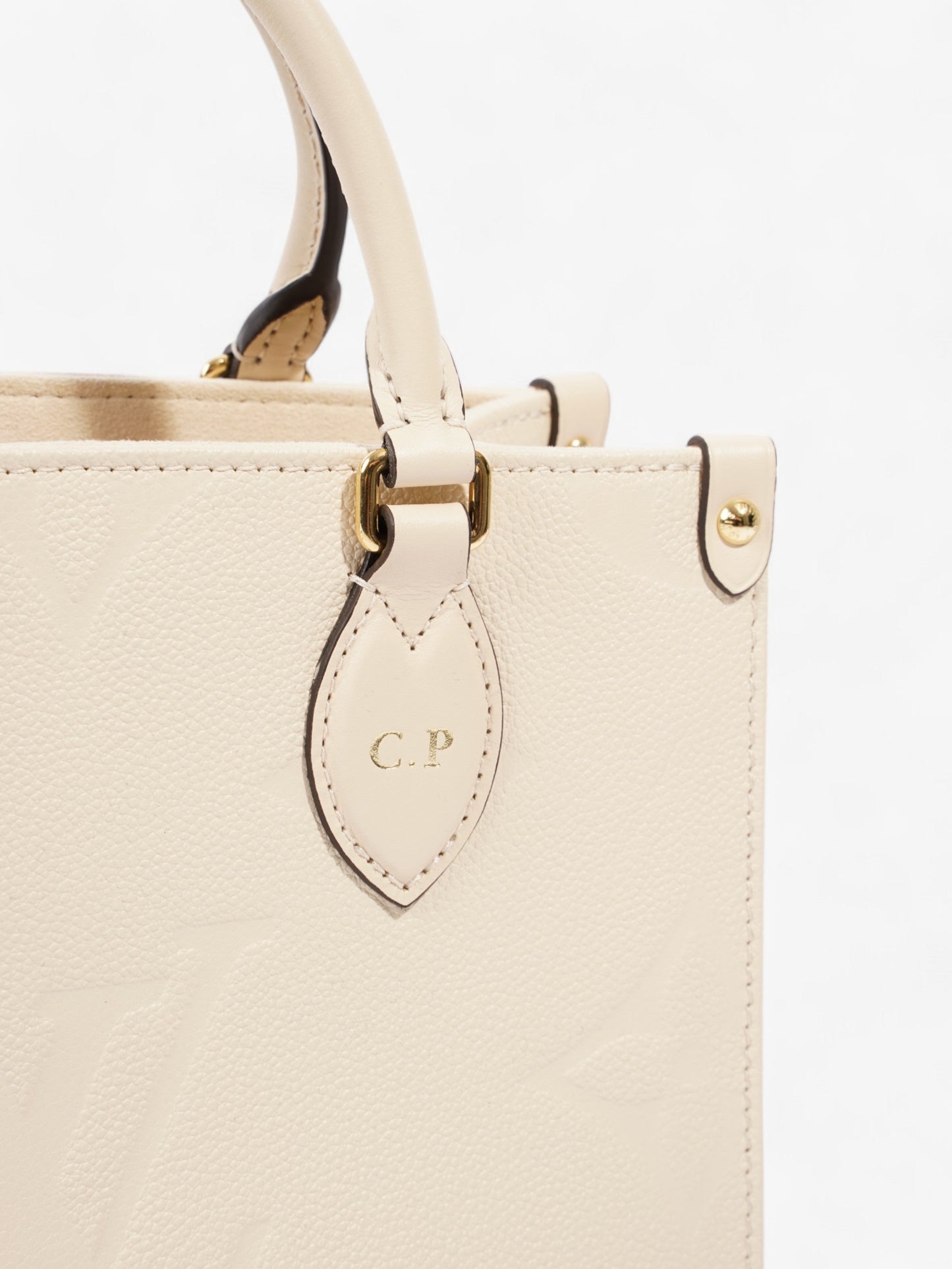 Louis Vuitton On the Go Creme Empreinte Leather PM