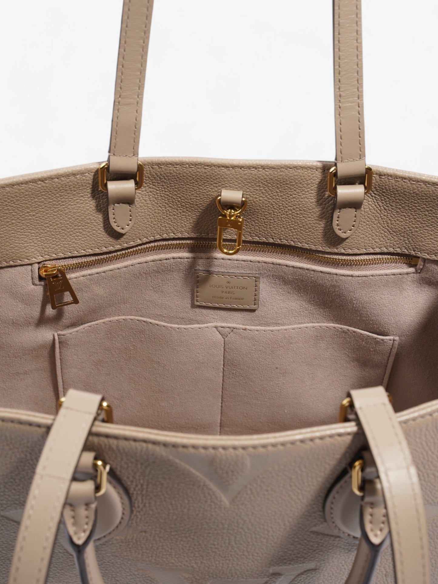 Louis Vuitton On the Go Monogram Empreinte / Beige Empreinte Leather MM