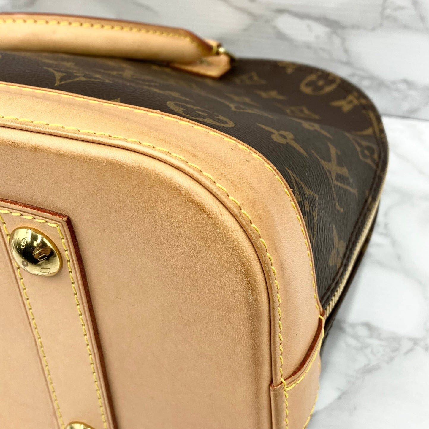 LOUIS VUITTON Monogram Alma PM Handbag