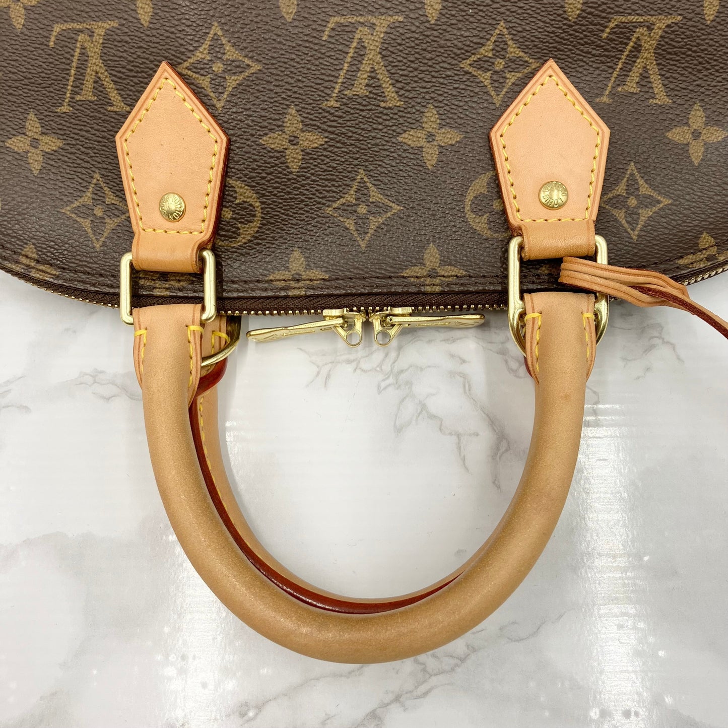 LOUIS VUITTON Monogram Alma PM Handbag