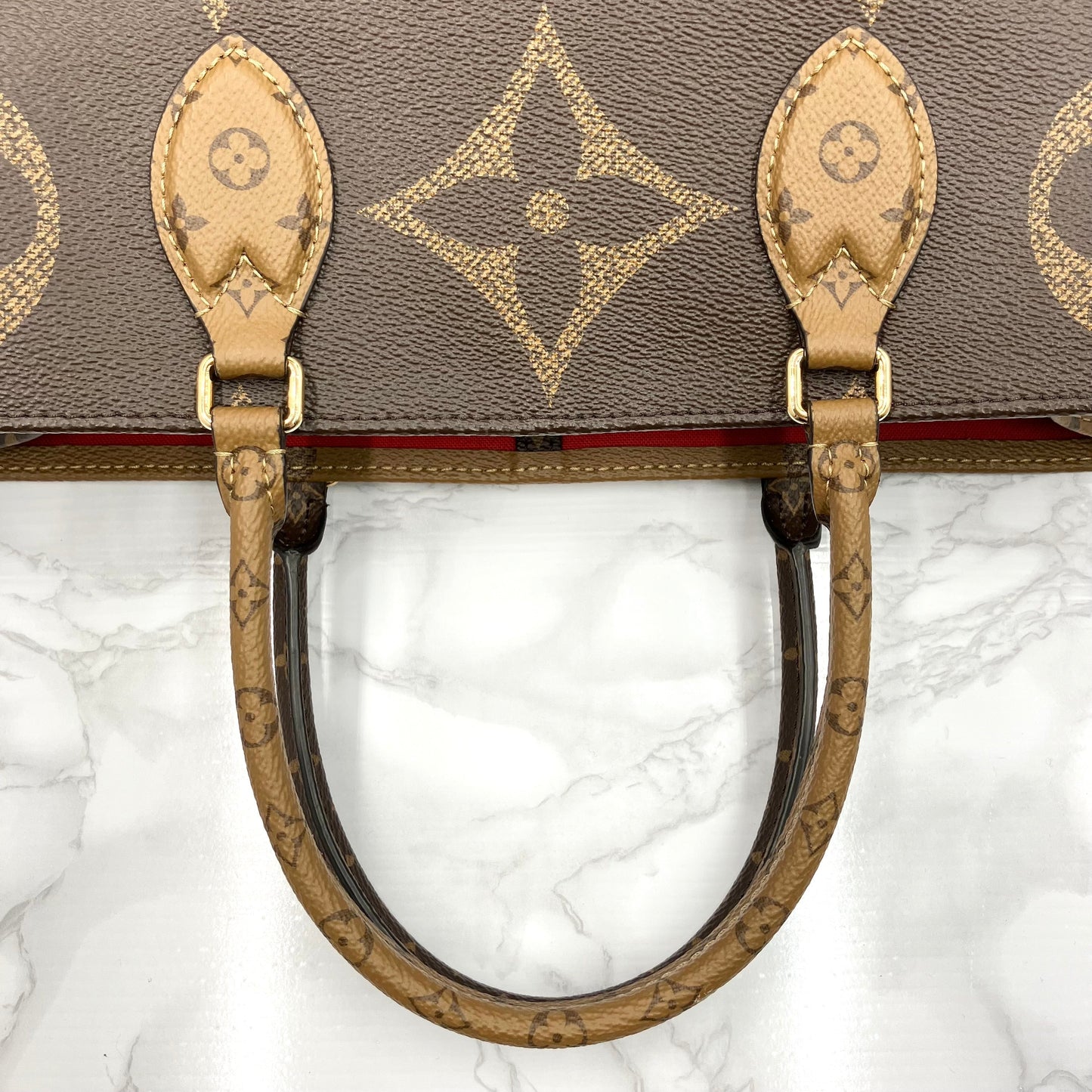 LOUIS VUITTON On The Go GM Monogram Giant Reverse