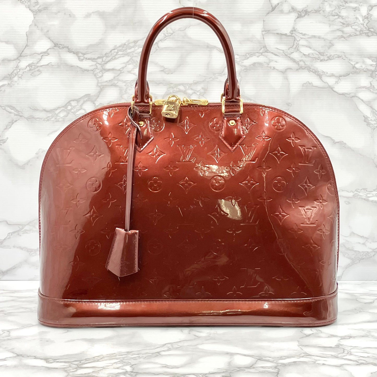 LOUIS VUITTON Vernis Alma MM