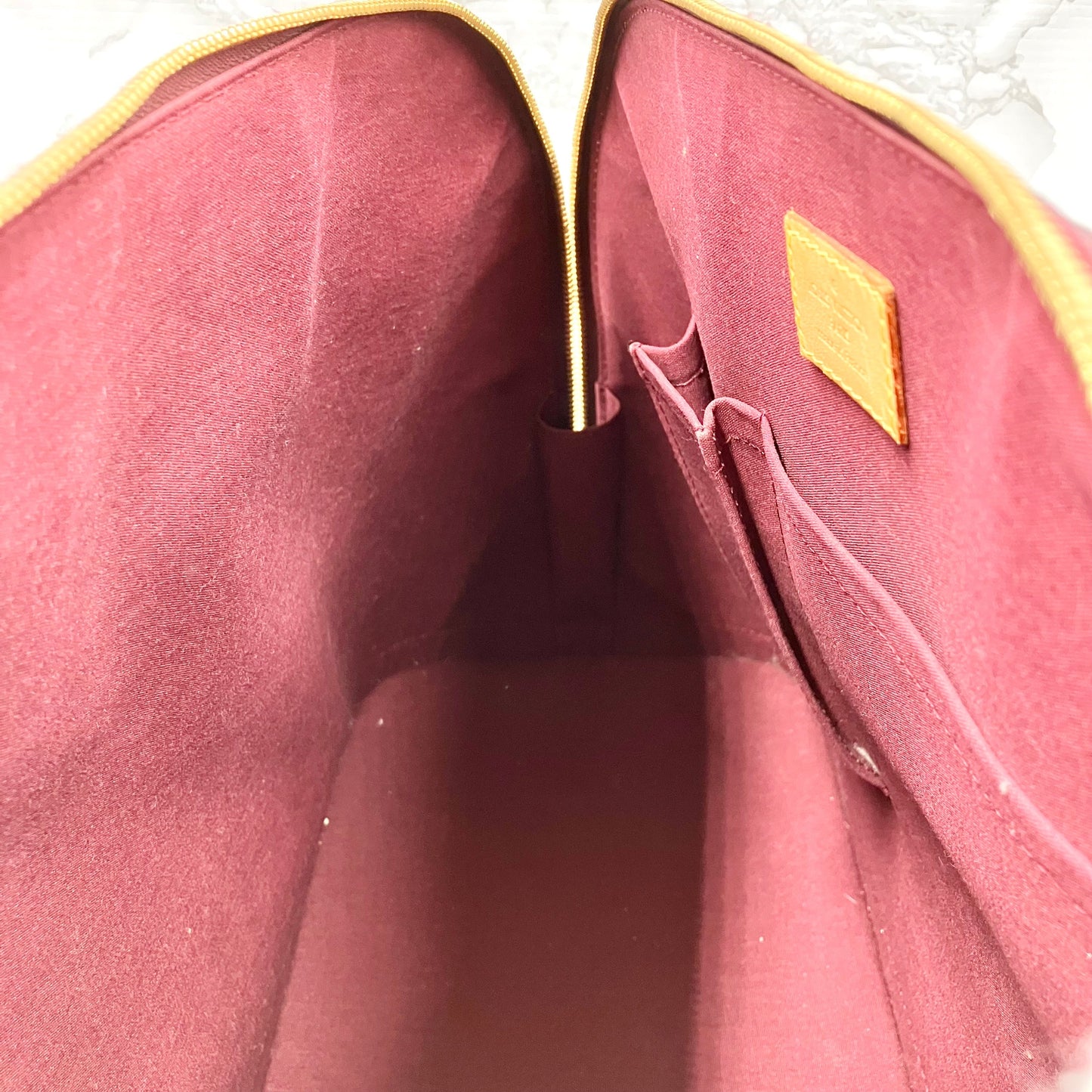 LOUIS VUITTON Vernis Alma MM