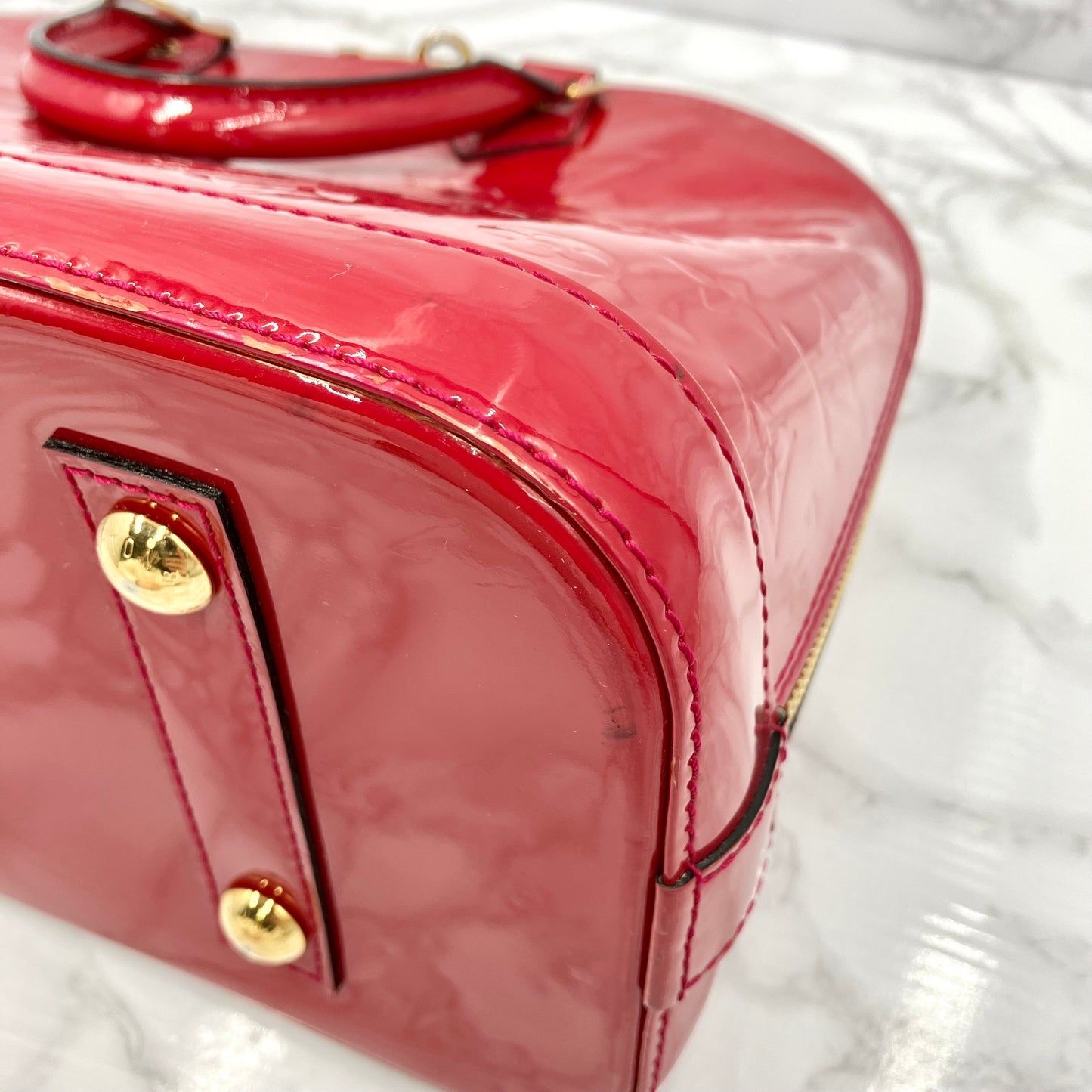 LOUIS VUITTON Vernis Alma PM