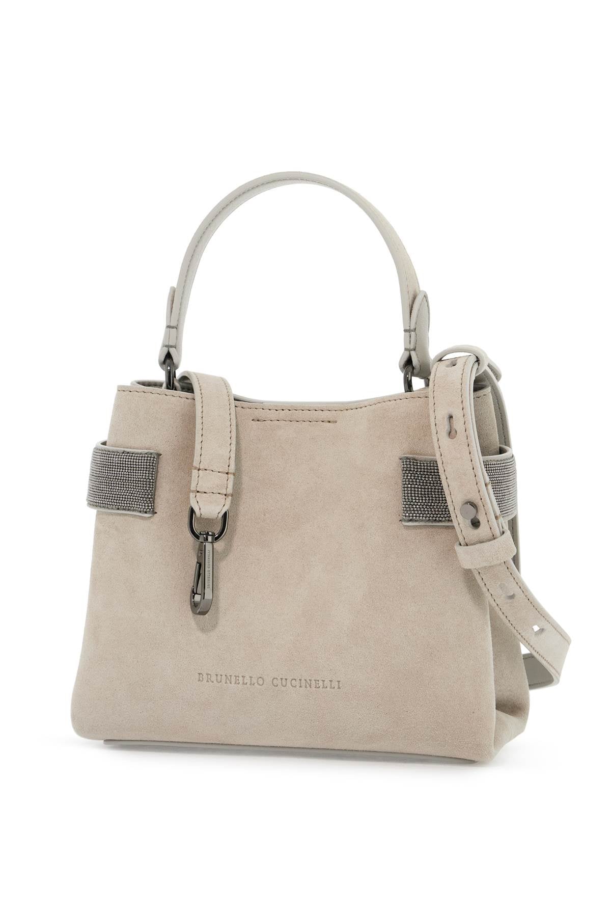 HANDBAG WITH PRECIOUS BANDS