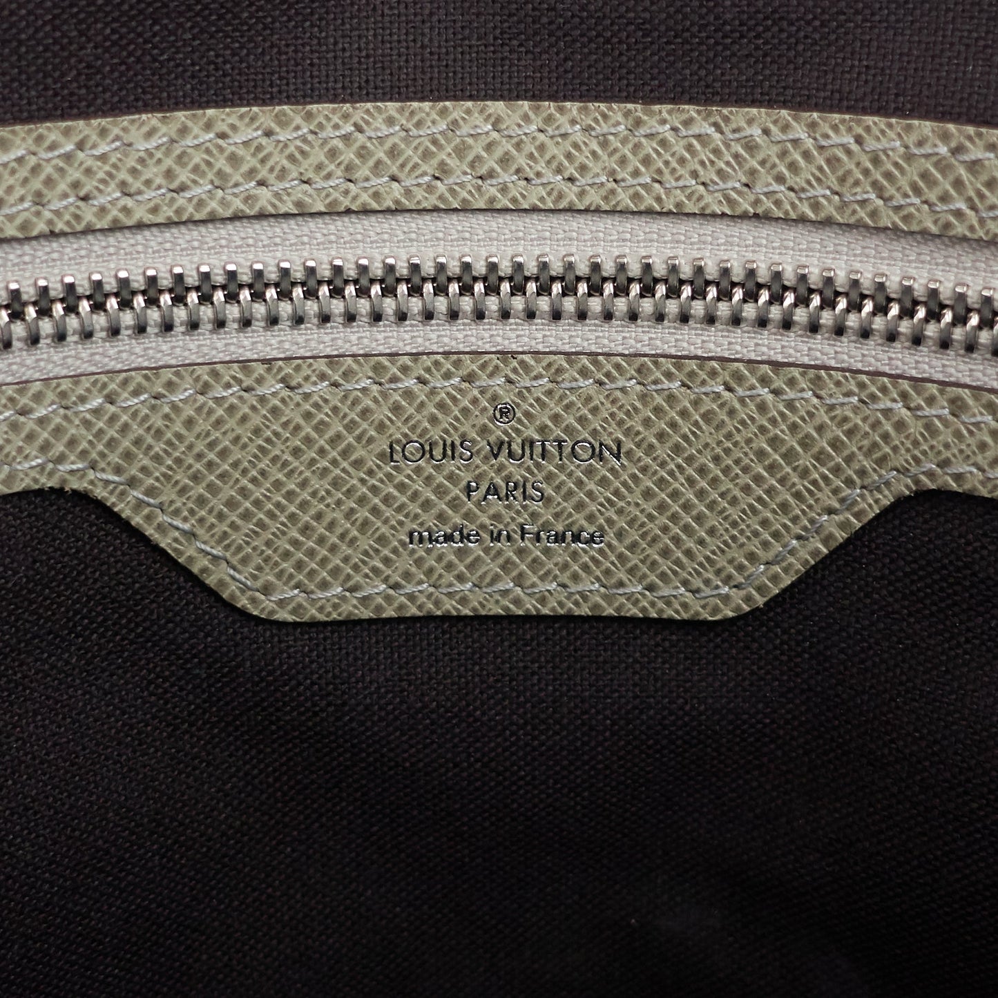 Louis Vuitto Milo Taiga Leather Messenger Bag